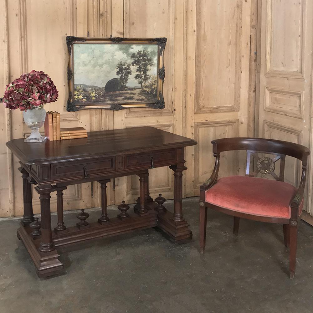 19th century French Henri II walnut writing table represents the epitome of classical architecture expressed in furniture designed to be used on a daily basis, and last for generations! Intricately designed support work includes finials, larger
