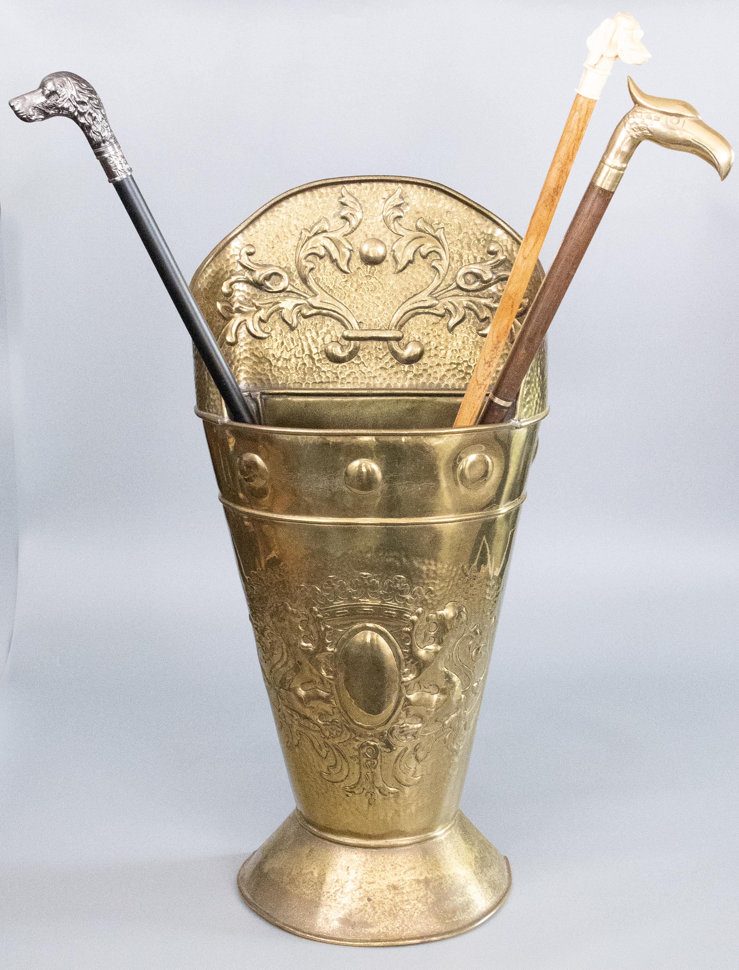 A superb large antique French hammered brass repoussé walking stick and umbrella stand, circa 1880. This was originally a grape hod or wine harvest basket but is ideal as an umbrella stand or for kindling by a fireplace. It's a fine quality hand