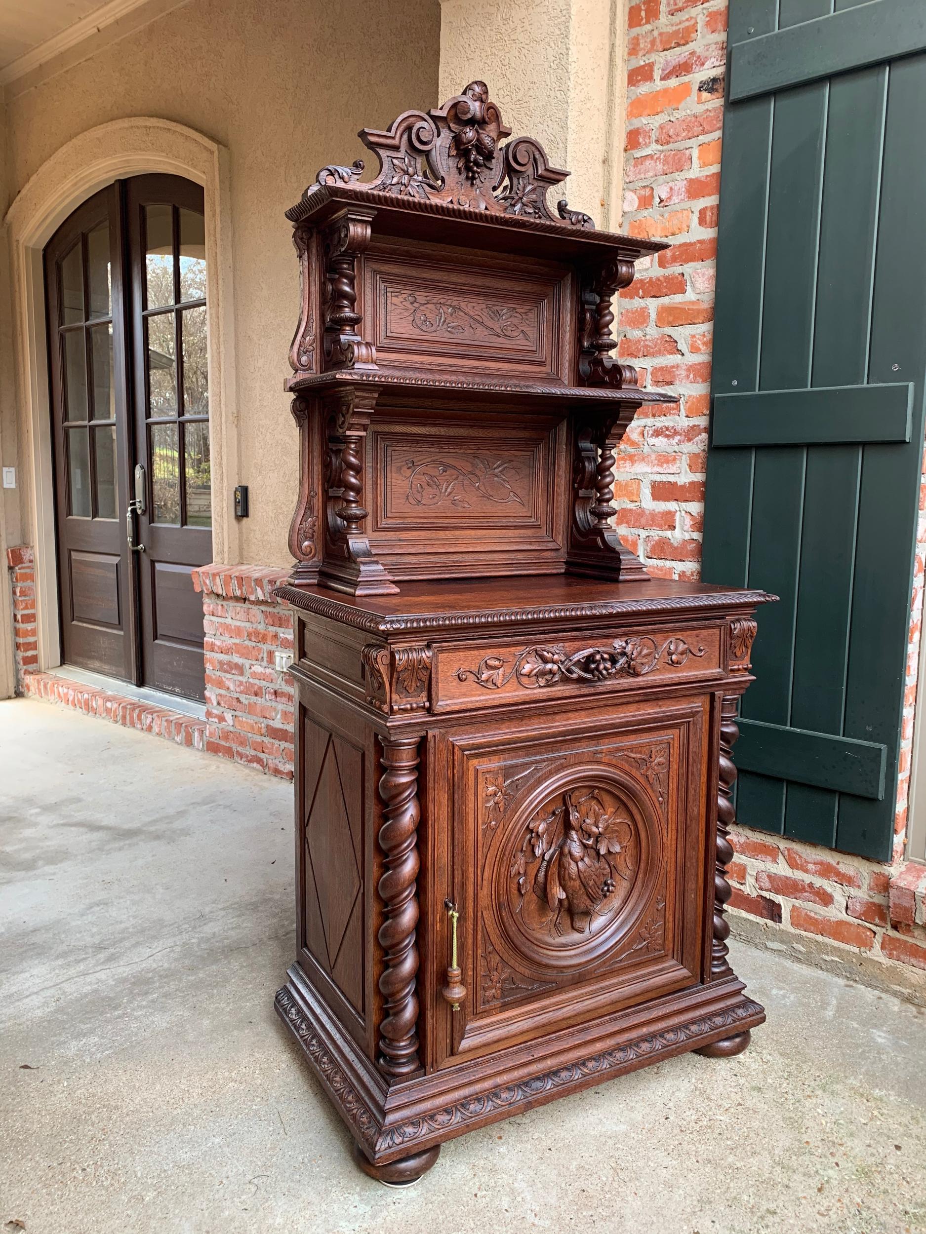 19th century French hunt cabinet bookcase Black Forest carved oak barley twist

~Direct from France~
~This stunning French ‘hunt cabinet’ or bookcase is loaded with all the features we look for in our antiques!~
~Tall and impressive, yet slender