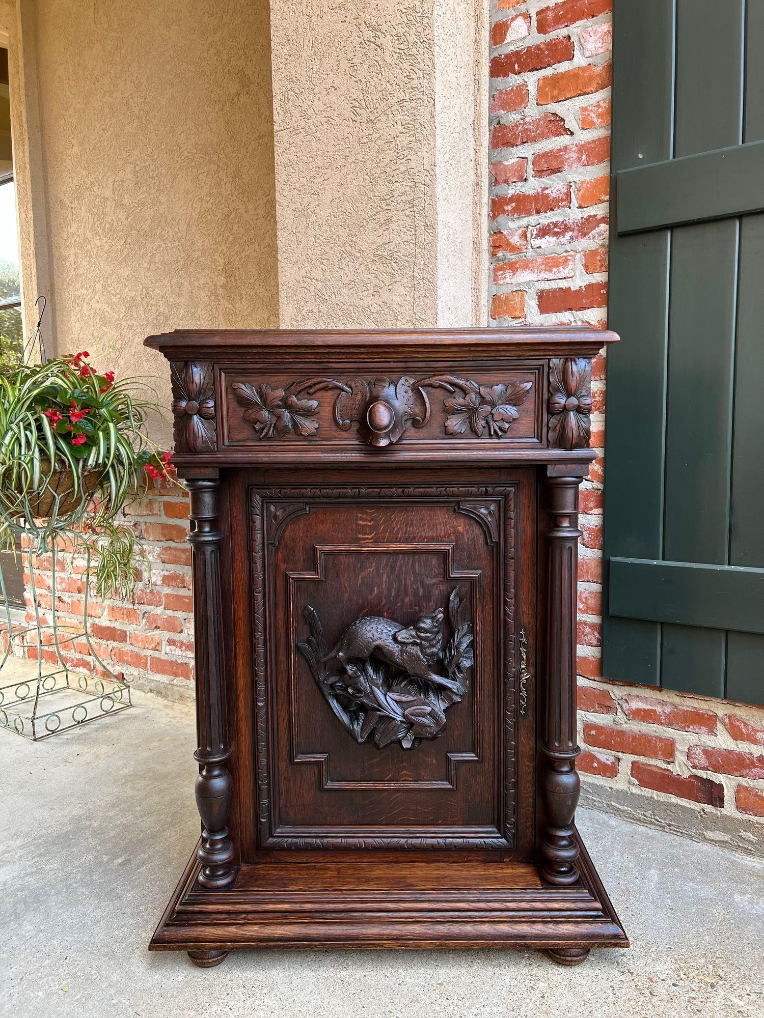 19th century French hunt cabinet carved oak black forest lodge foyer sideboard.

Directly imported from France, a beautifully hand carved 19th century French “jam” or confiturier cabinet, in a versatile size, perfect for placement in any room and