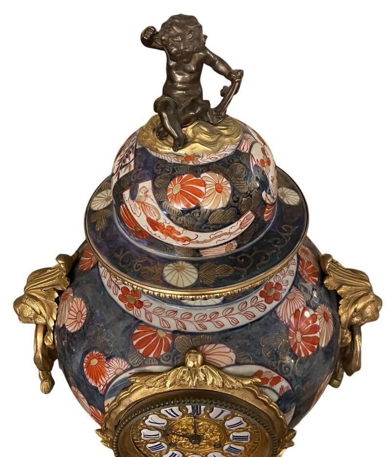 19th Century French Imari Porcelain & Patinated Bronze Garniture Clock Set For Sale 3