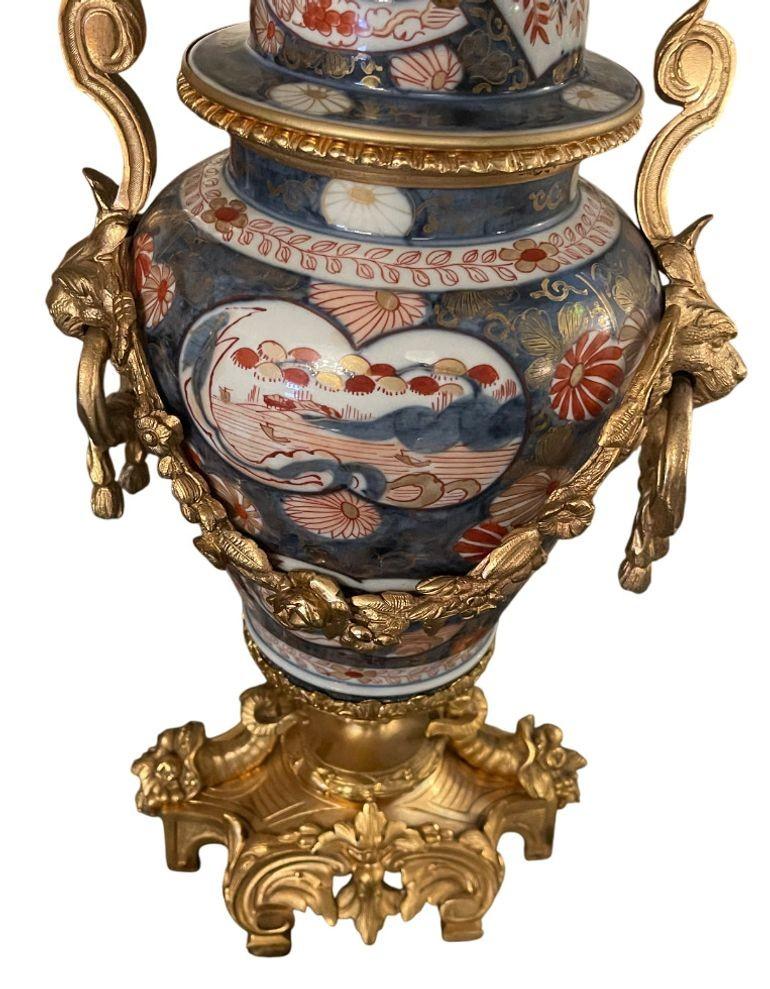 19th Century French Imari Porcelain & Patinated Bronze Garniture Clock Set For Sale 5