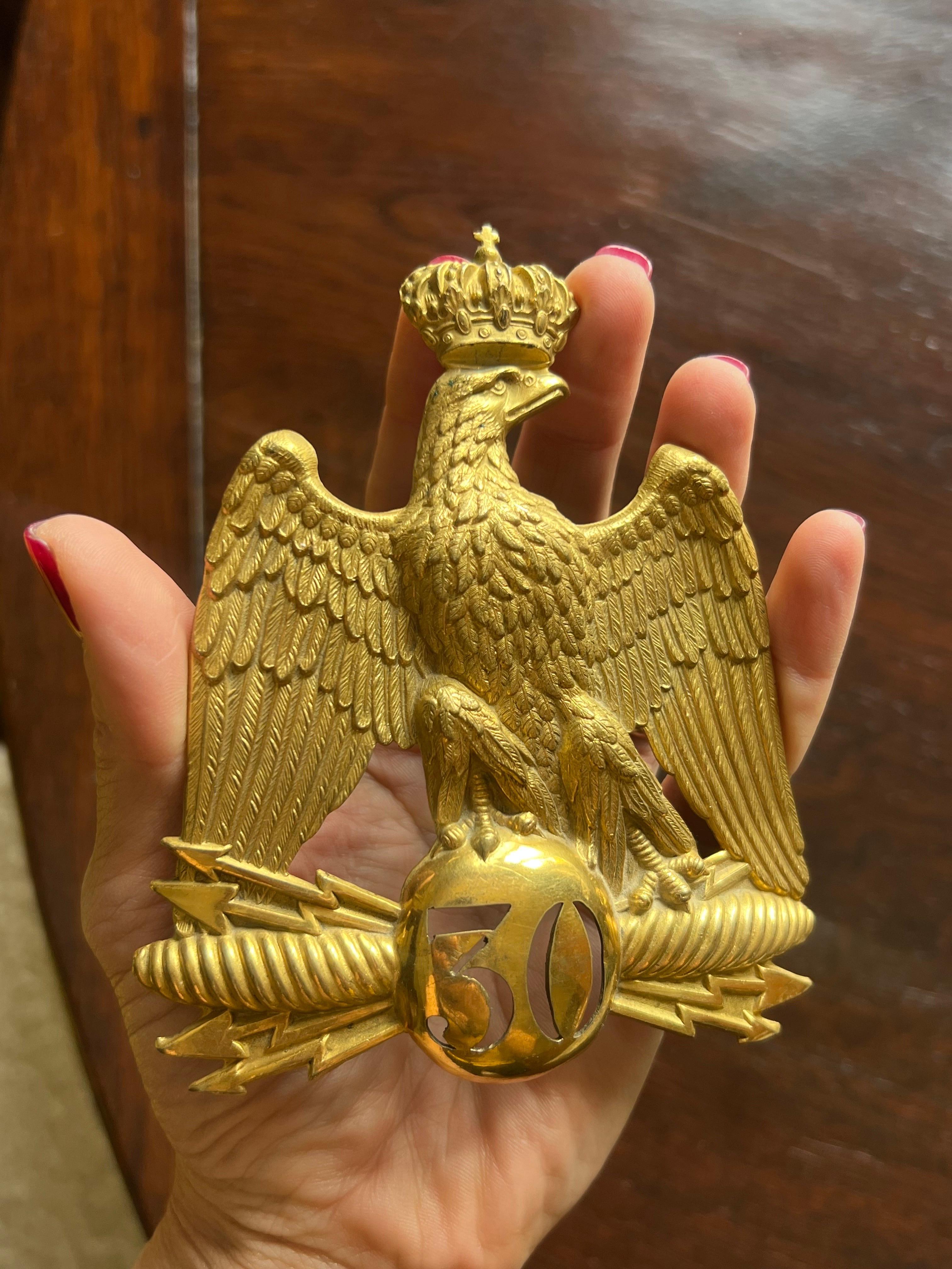 19th Century beautiful imperial eagle badge from Napoleon III period. Crowned eagle with spread wings, standing on an orb cut out with the number 30. Two fixing parts at the back of the wings.
France, circa 1830