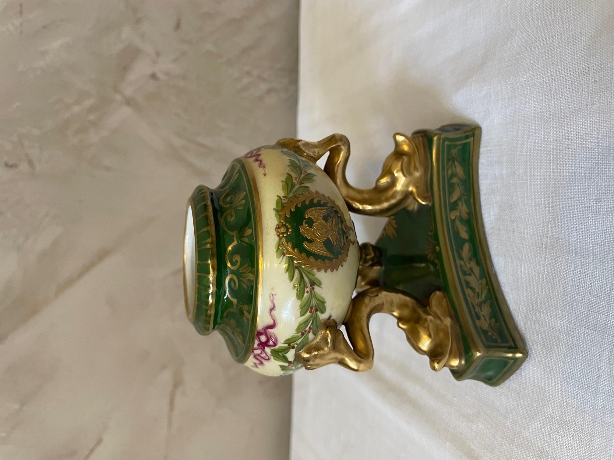 Beautiful 19th century French porcelain inkwell from the imperial manufacture of Sevres. Green and gold decor with dolphin's head. 
Stamped Sevres at the back. Rare item.