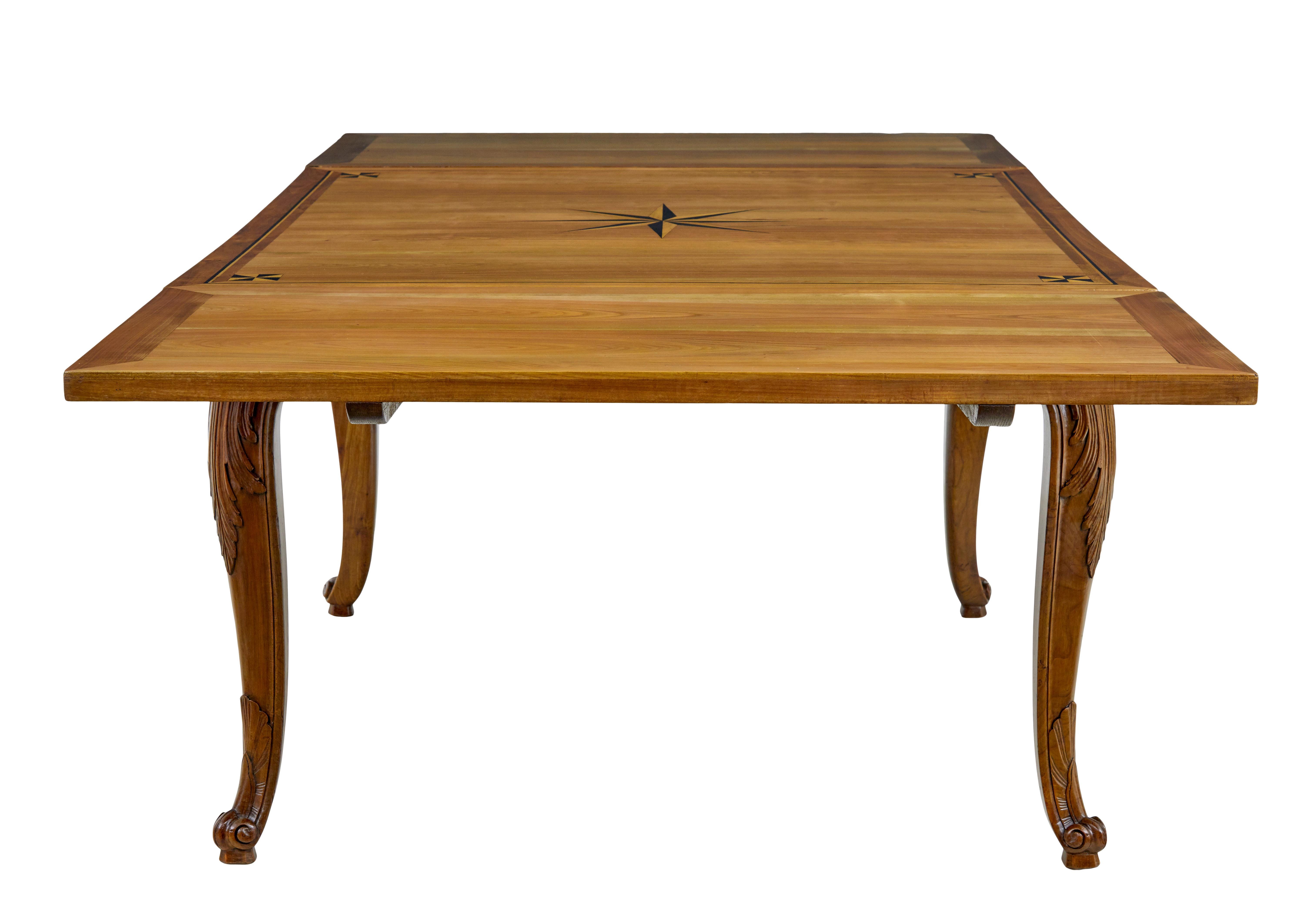 Carved 19th century french inlaid fruitwood extending dining table For Sale