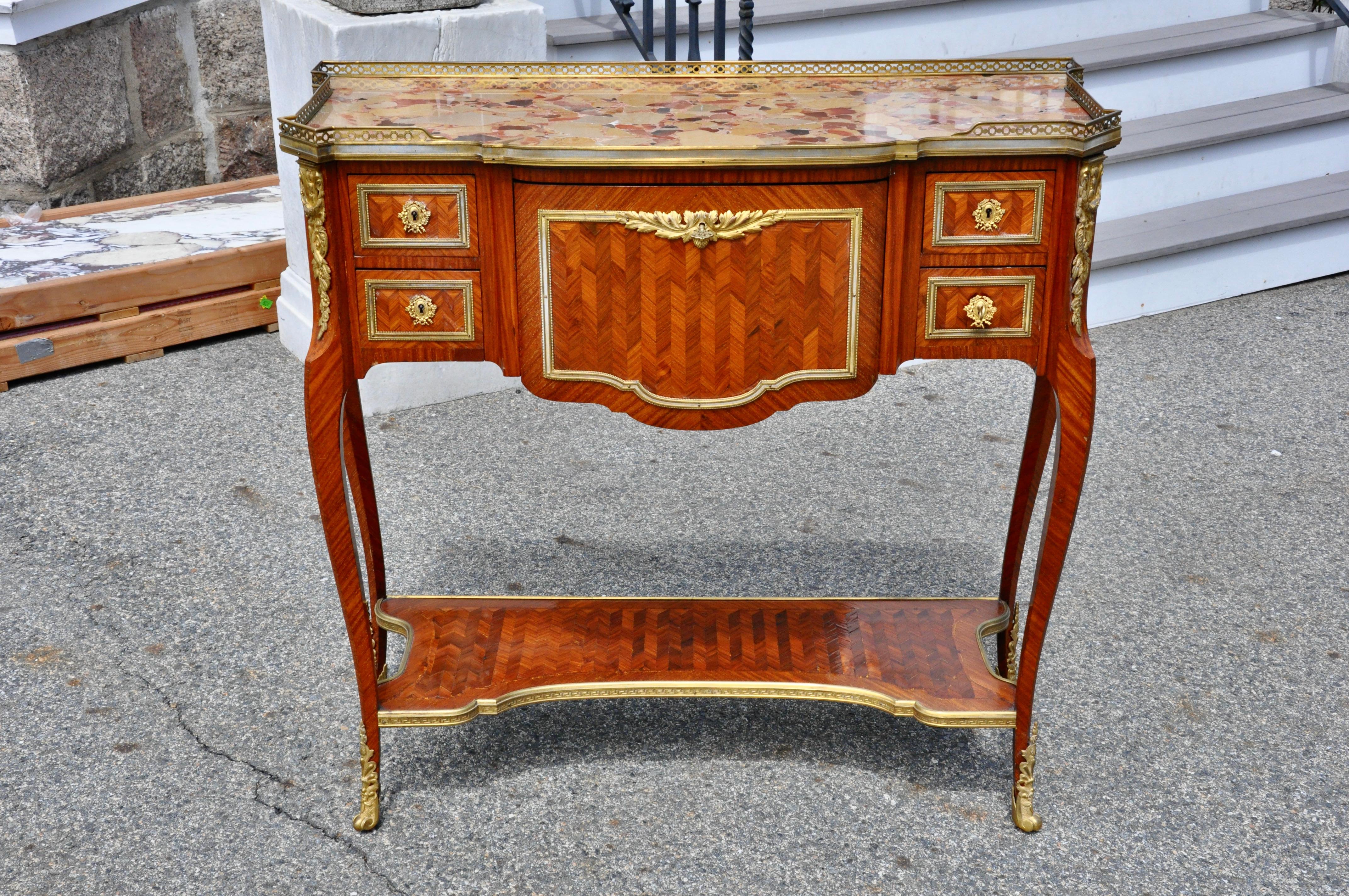 19th century kingwood parquetry and marble top serving table with rare dropfront secretary interior. Ormolu mounts and original galleried marble top.