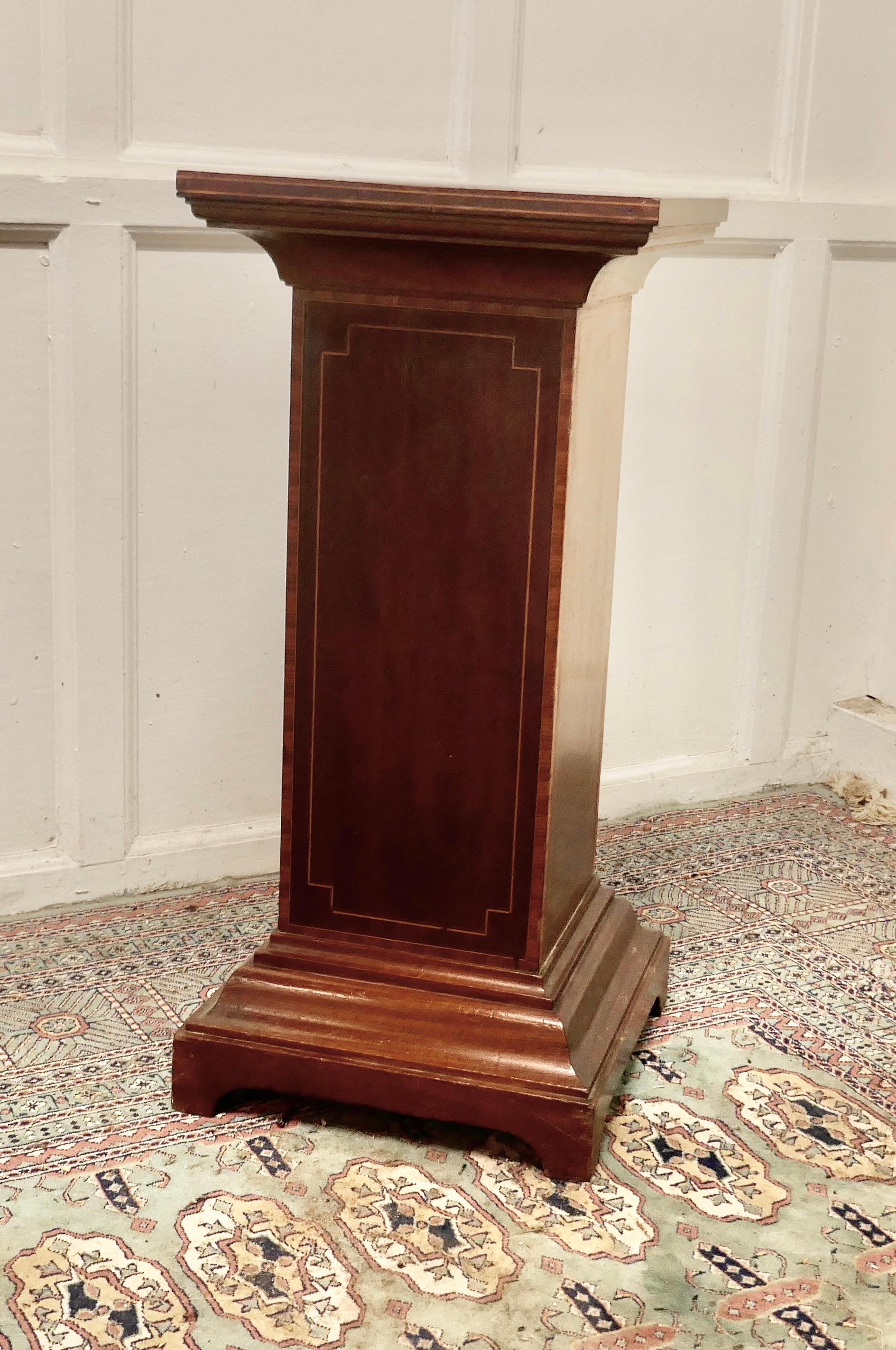 19th century French inlaid mahogany column display pedestal

This is a rectangular column, it is set on a stepped base with a square top
The Column is made in mahogany and has an inlaid border decoration, it is sound and in good used condition
