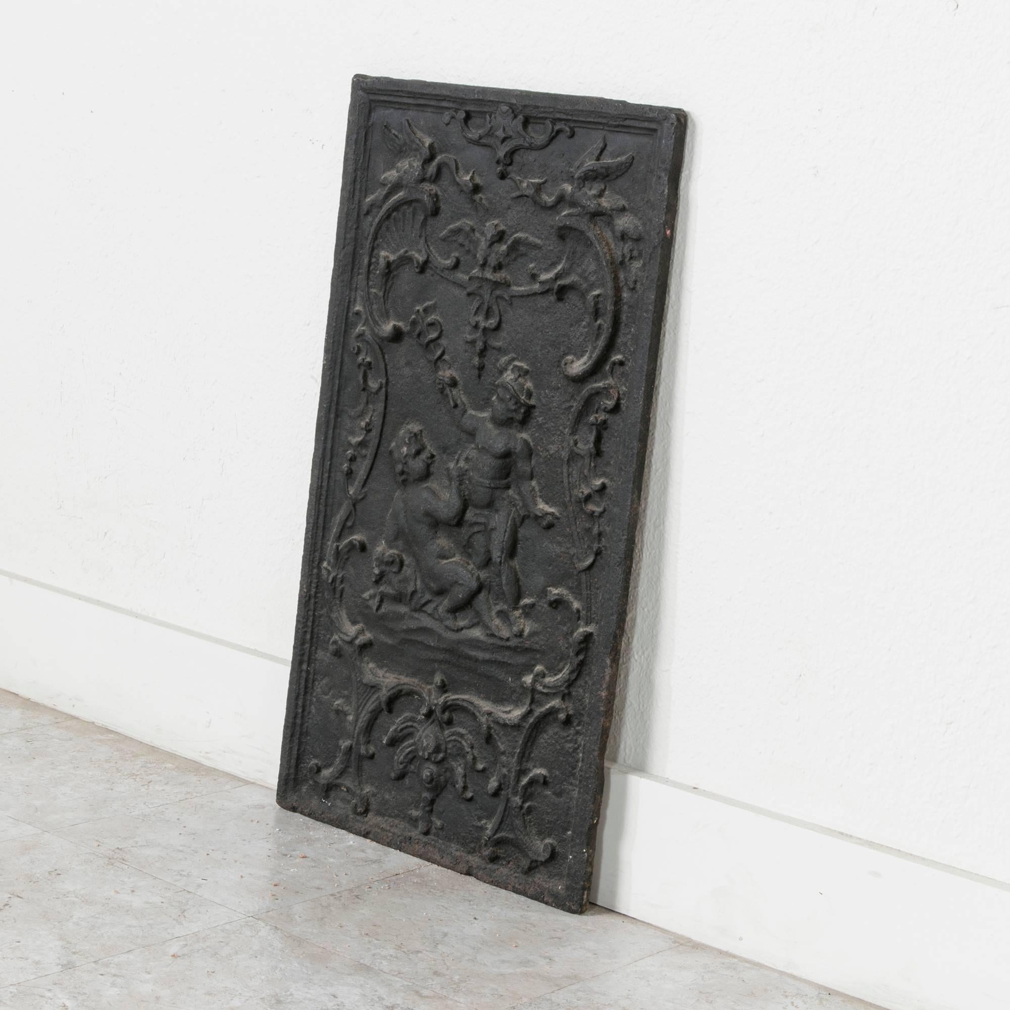 19th Century French Iron Fireplace Plaque with Putti, Vertical Orientation In Good Condition For Sale In Fayetteville, AR