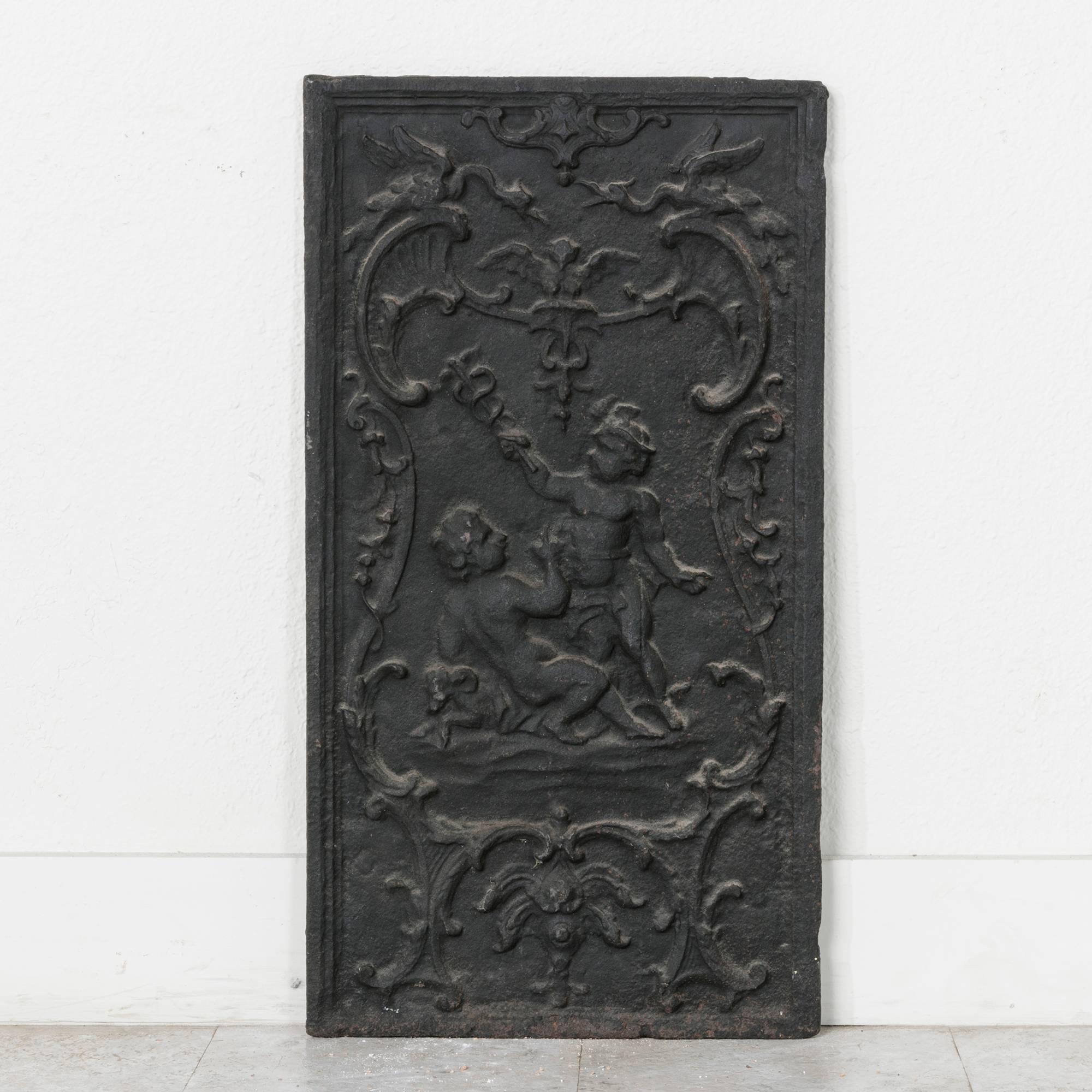 19th Century French Iron Fireplace Plaque with Putti, Vertical Orientation For Sale 1