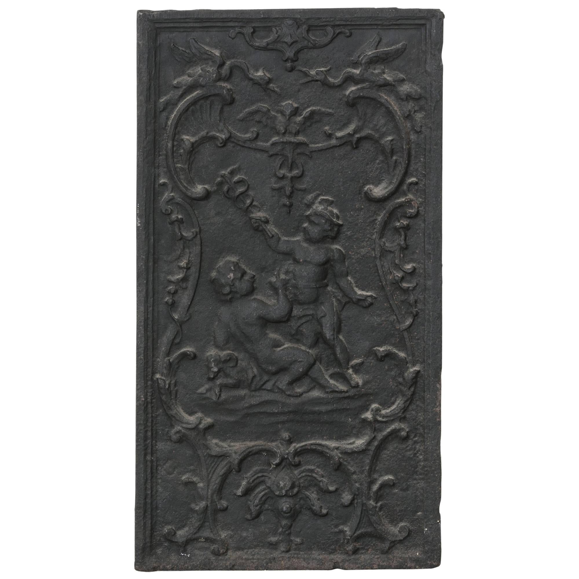 19th Century French Iron Fireplace Plaque with Putti, Vertical Orientation For Sale