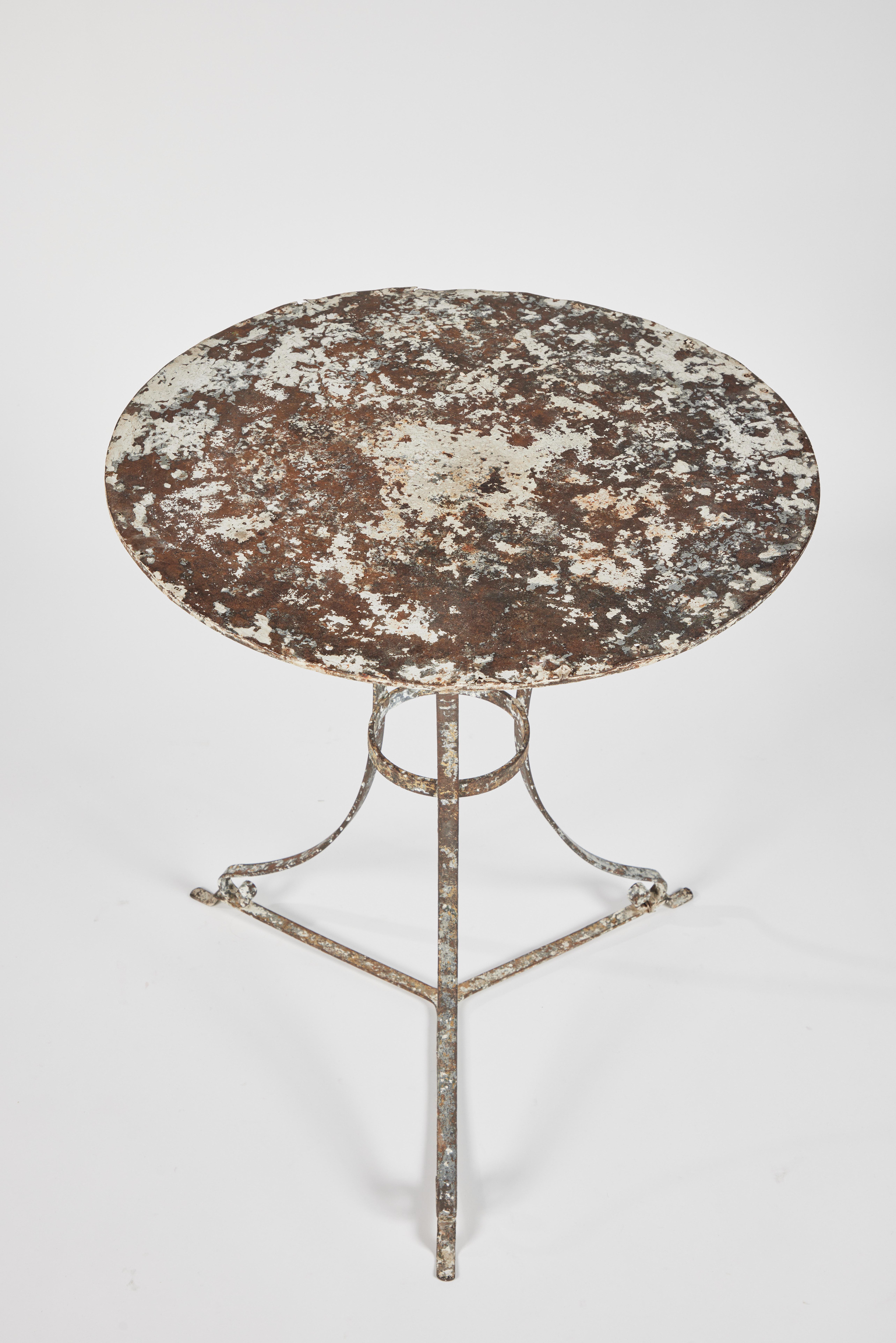 19th century French iron garden table, oxidation/natural rust from outdoor use.