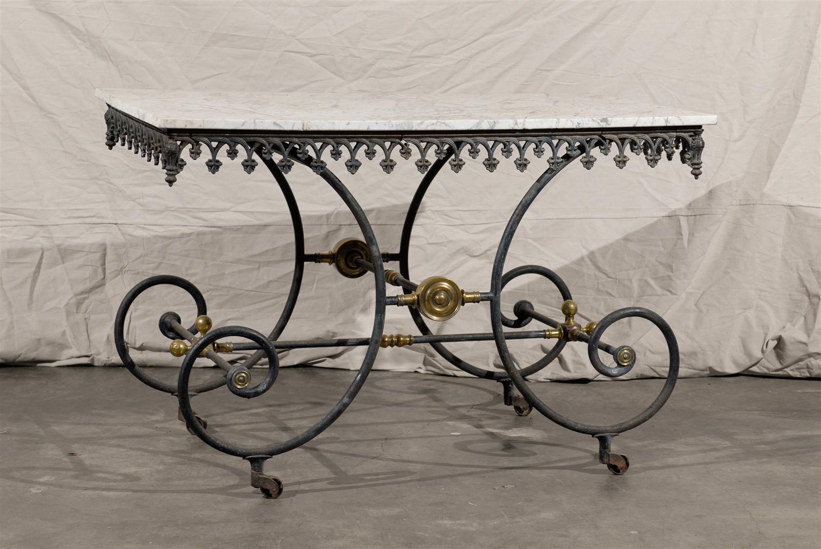 19th century French iron and marble-top pastry table with gilt accents.