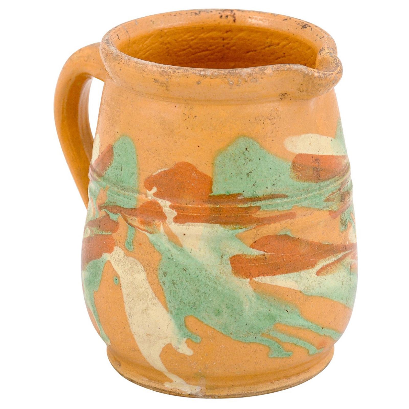 19th Century French Jaspe Pottery Pitcher with Yellow Glaze and Green Accents