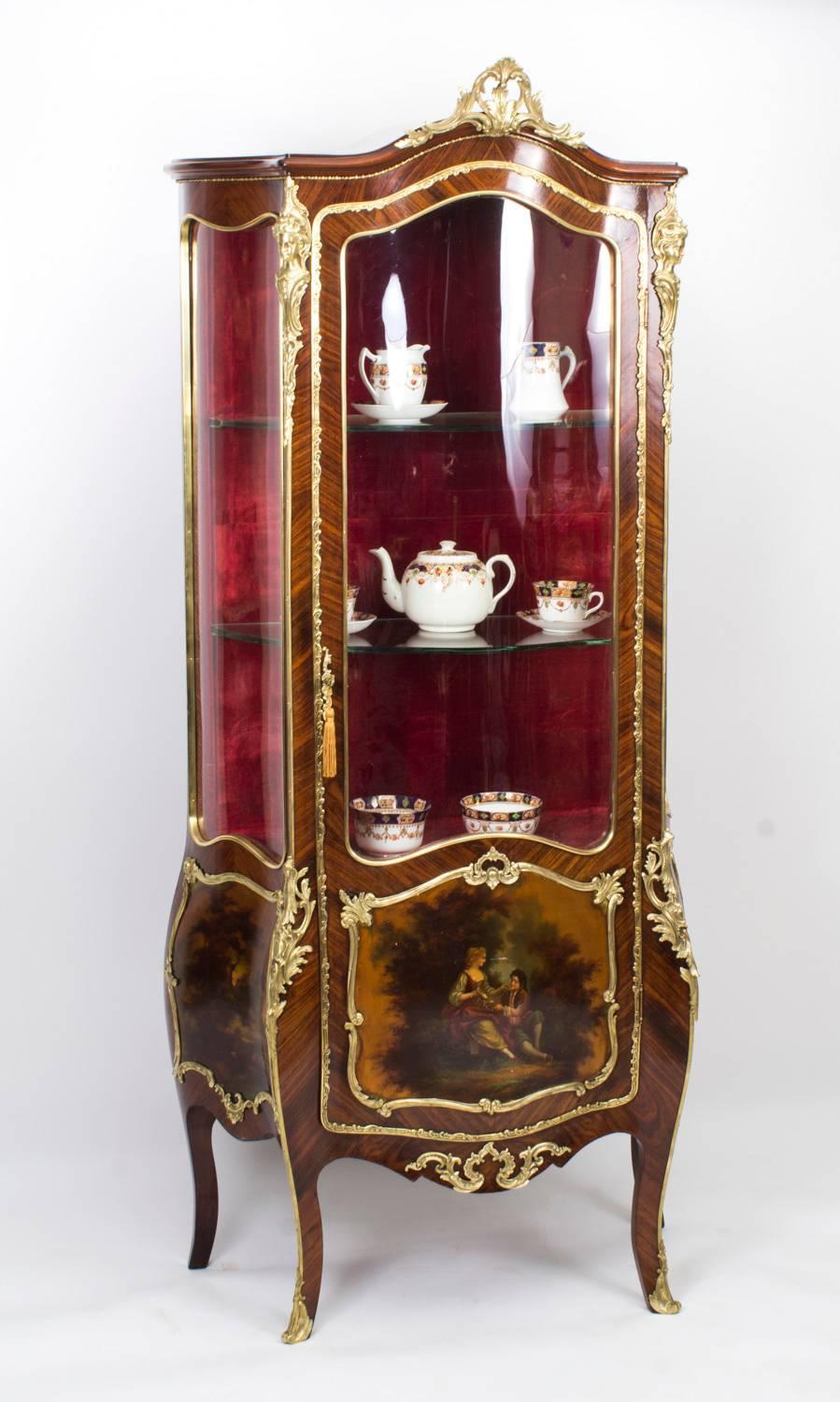 This is a stunning antique French kingwood Vernis Martin vitrine in the Louis XV manner, circa 1880 in date. The base features three hand-painted Vernis Martin panels, the central panel is signed by the artist, Albertini, who was renowned for