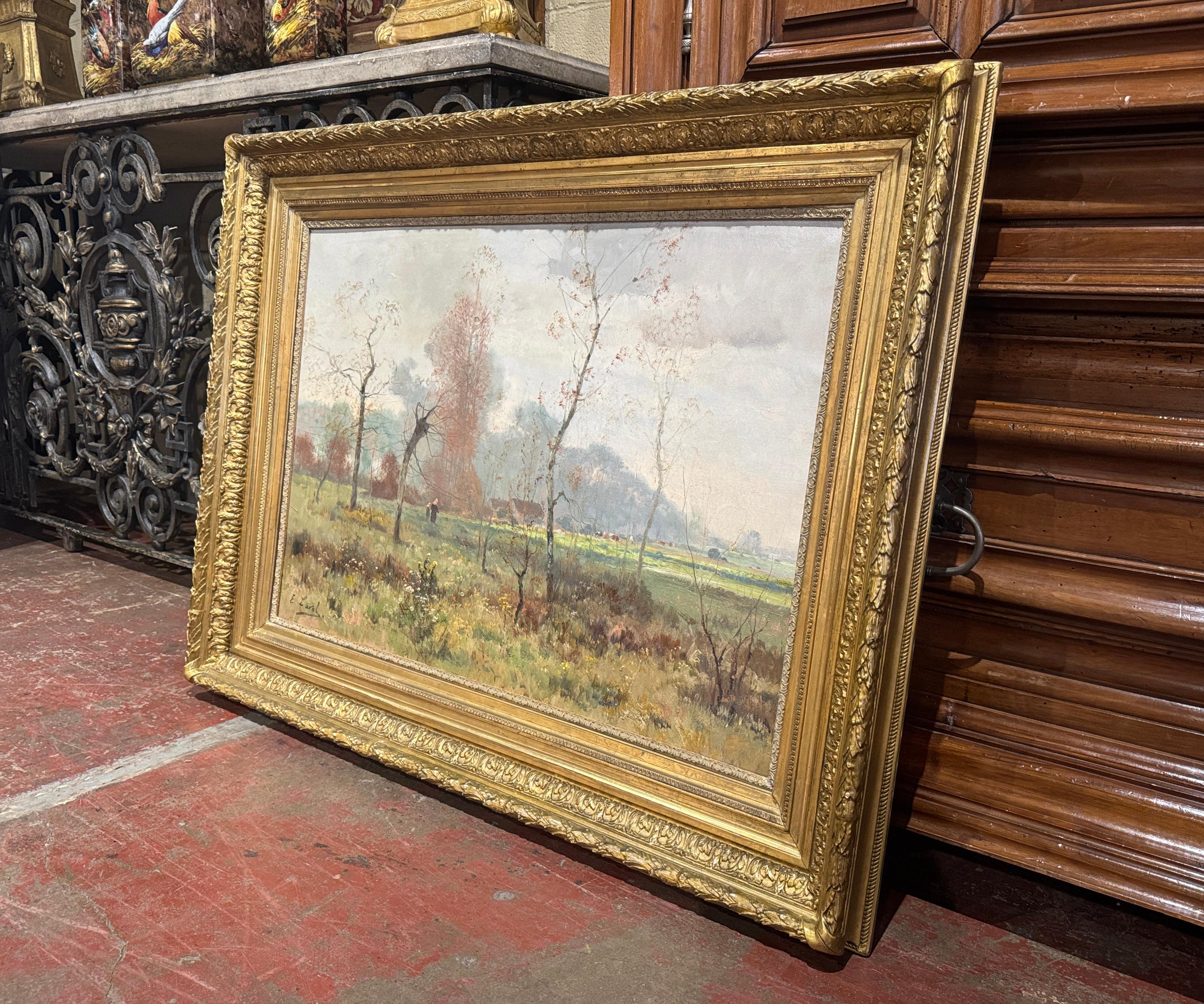 Decorate an office or study with this large antique oil on canvas painting. Created in France circa 1890, and signed by French artist, E. Laval, the artwork is set in the original carved giltwood frame. The beautifully executed landscape painting