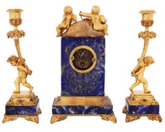 19th Century French Lapis and Ormolu Clock and Candlesticks with Cherubs