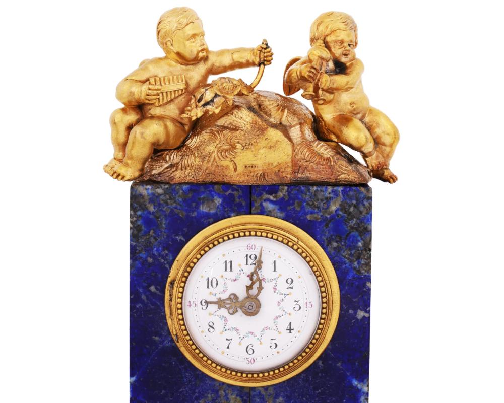 Lapis Lazuli 19th Century French Lapis and Ormolu Clock and Candlesticks with Cherubs For Sale