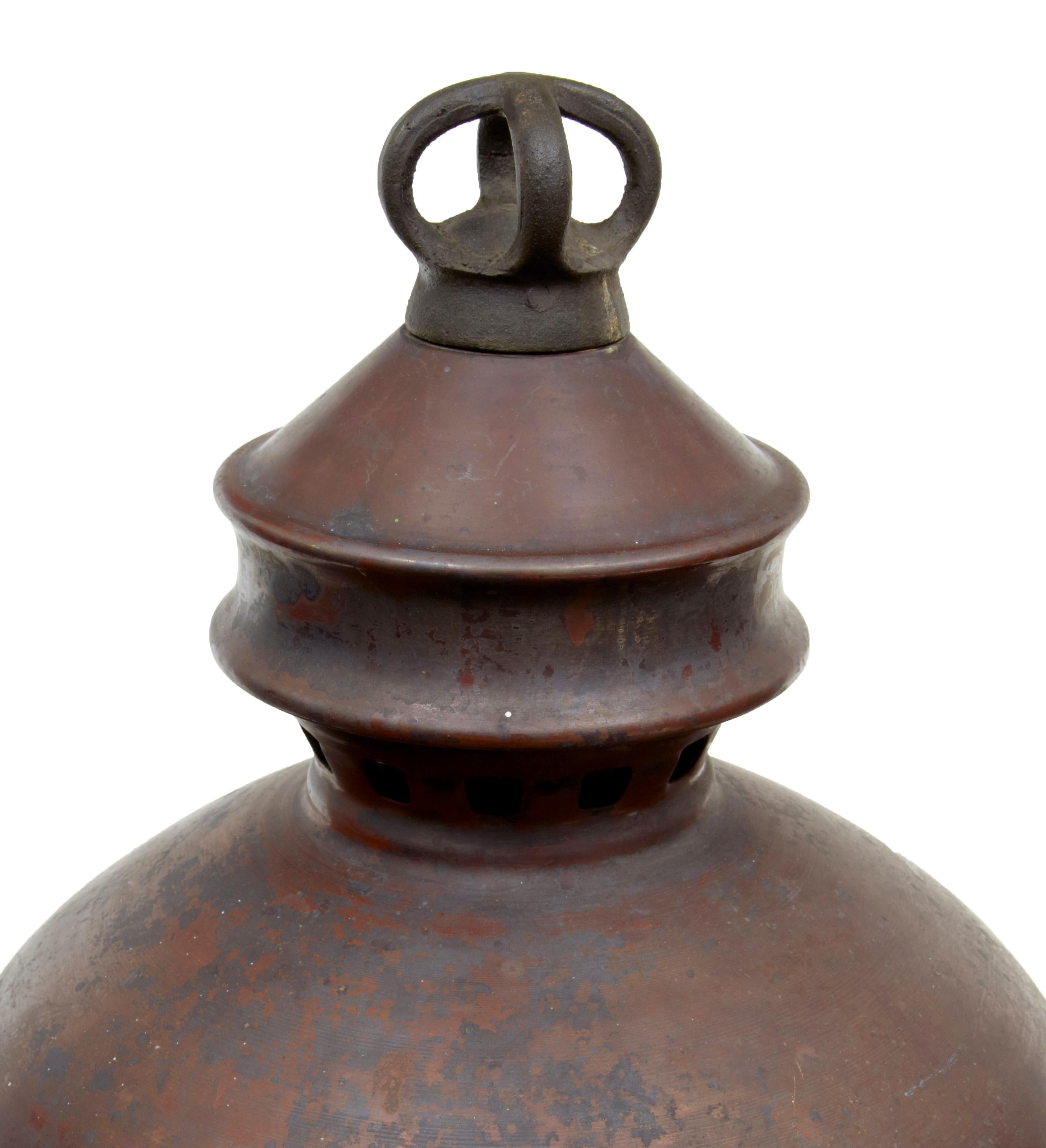 19th century French large copper and glass lantern, circa 1880.

Here we offer a great opportunity to make a light feature for inside or for outdoors. Copper dome top standing on top of the original glass bowl. Standing on a horseshoe like