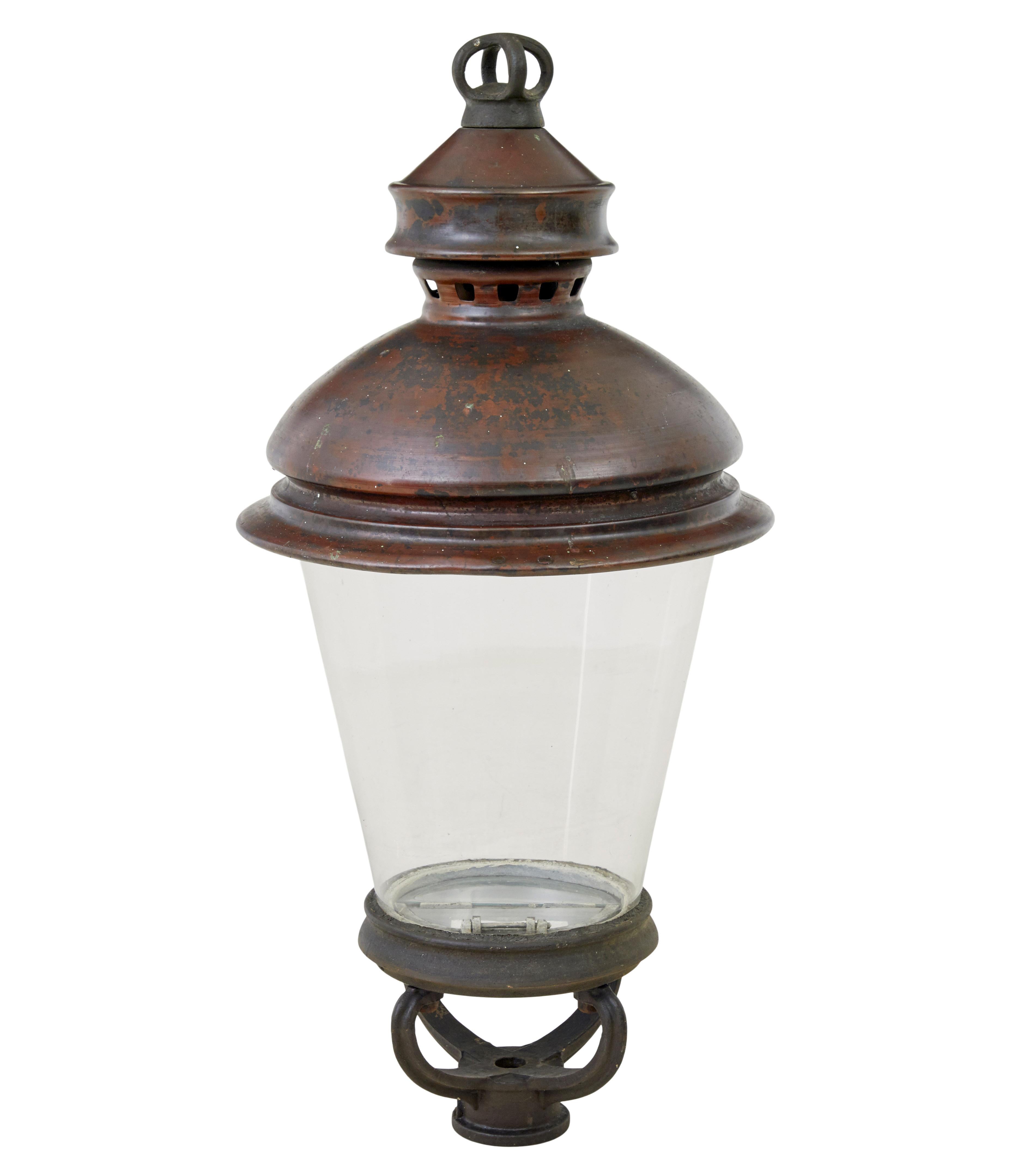 19th century french large copper and glass lantern, circa 1880.

Here we offer a great opportunity to make a light for inside or into a garden feature. Copper dome top standing on top of the original glass bowl. Standing on a horseshoe like base. 