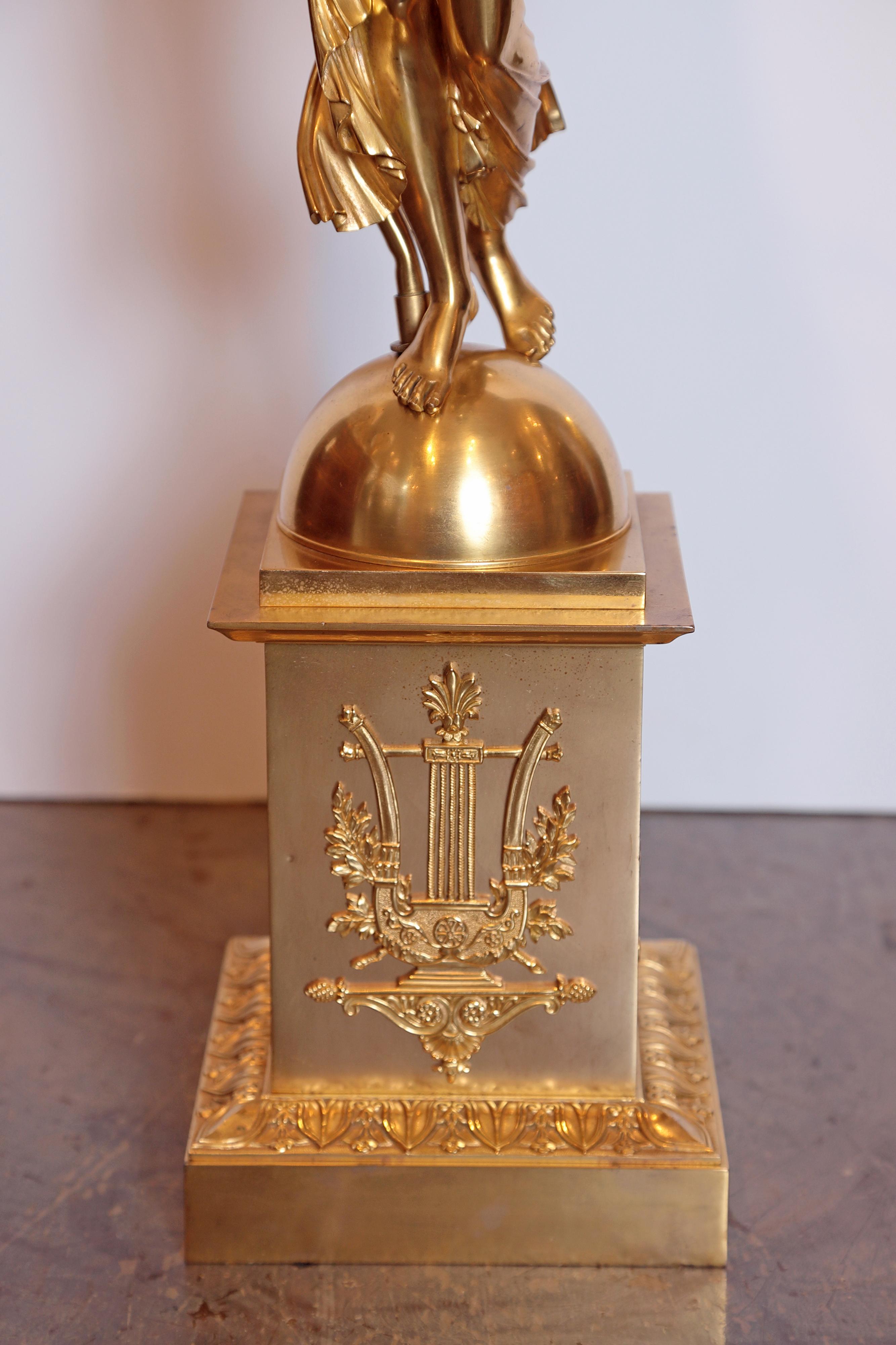19th century French Empire gilt bronze female figural lamp.