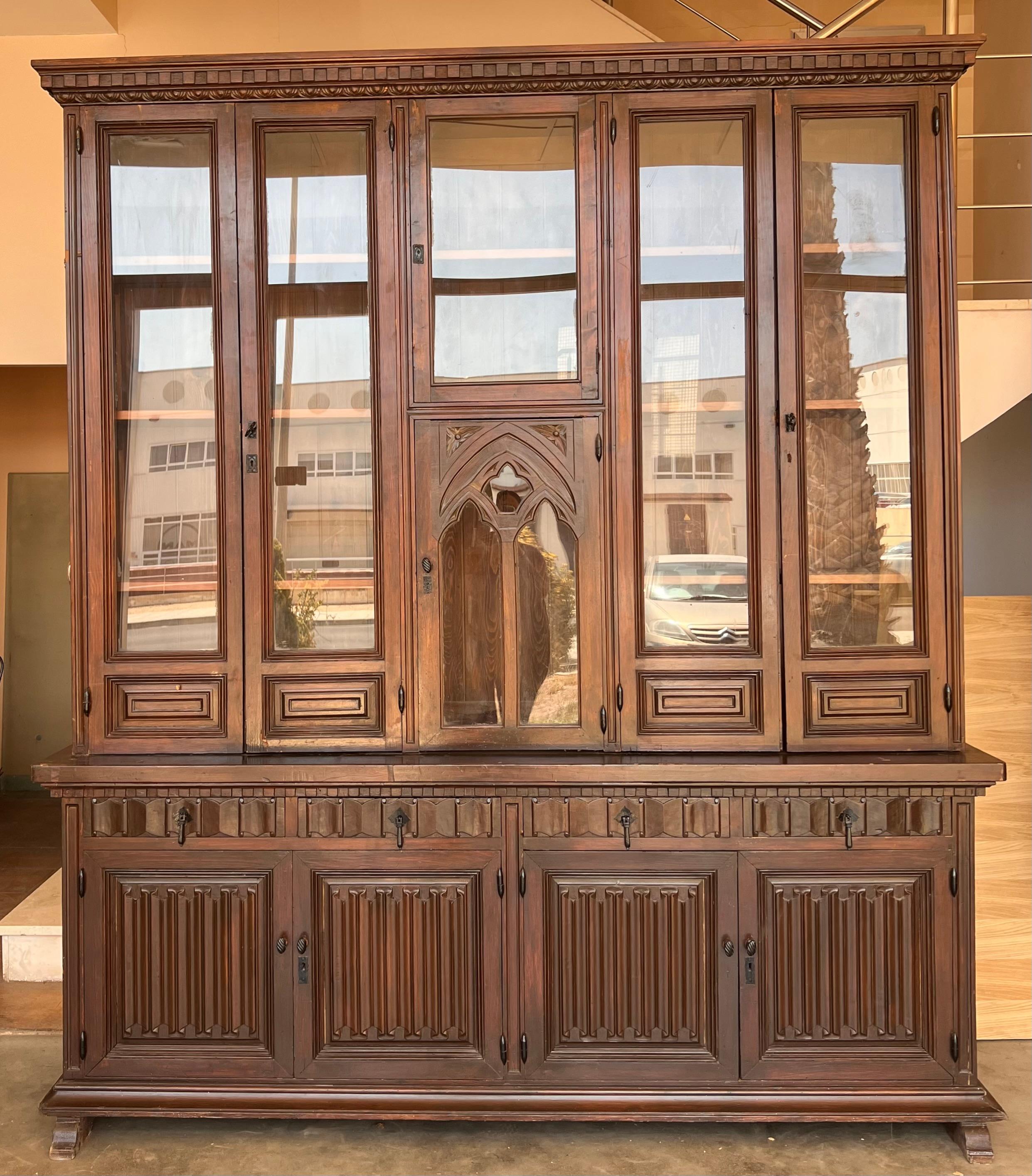 Great quality late 19th century French Empire period bookcase. Having a moulded cornice above a pair of shaped glazed doors with original old glass and flanked by pilasters terminating in classic reeded bun feet.