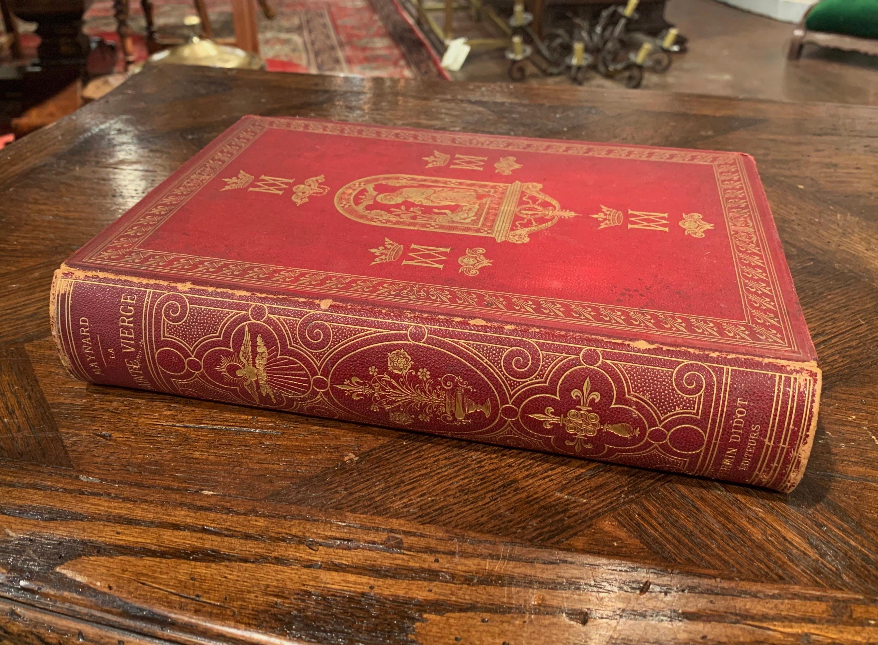 Decorate a shelf or a library with this beautiful antique red book named 