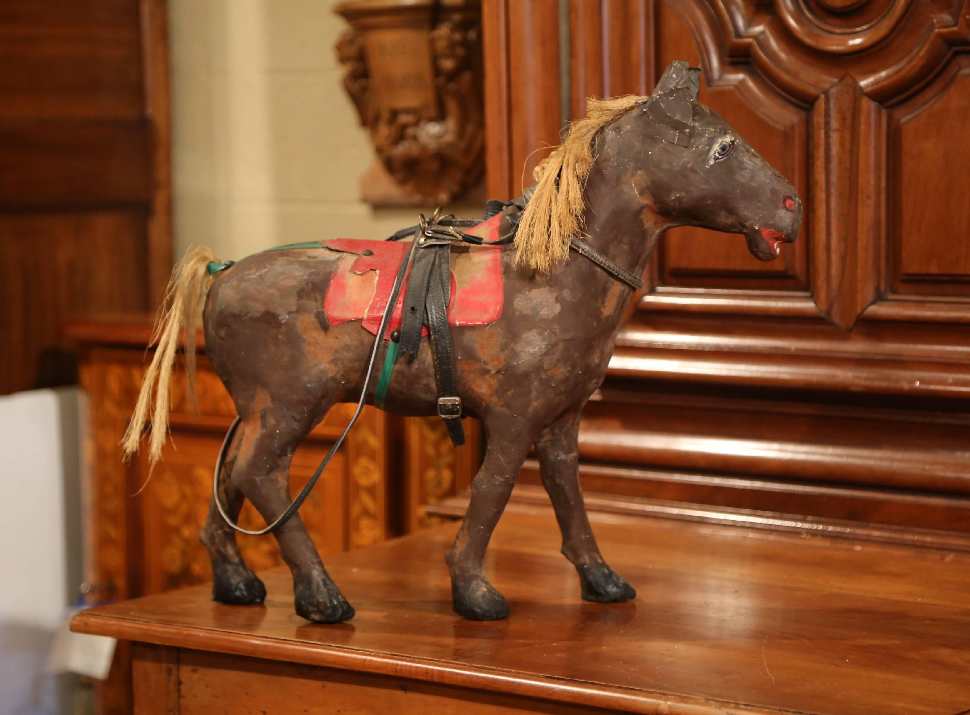 Interesting antique horse sculpture from France; crafted, circa 1870, the sculpture features a hand painted horse made of 