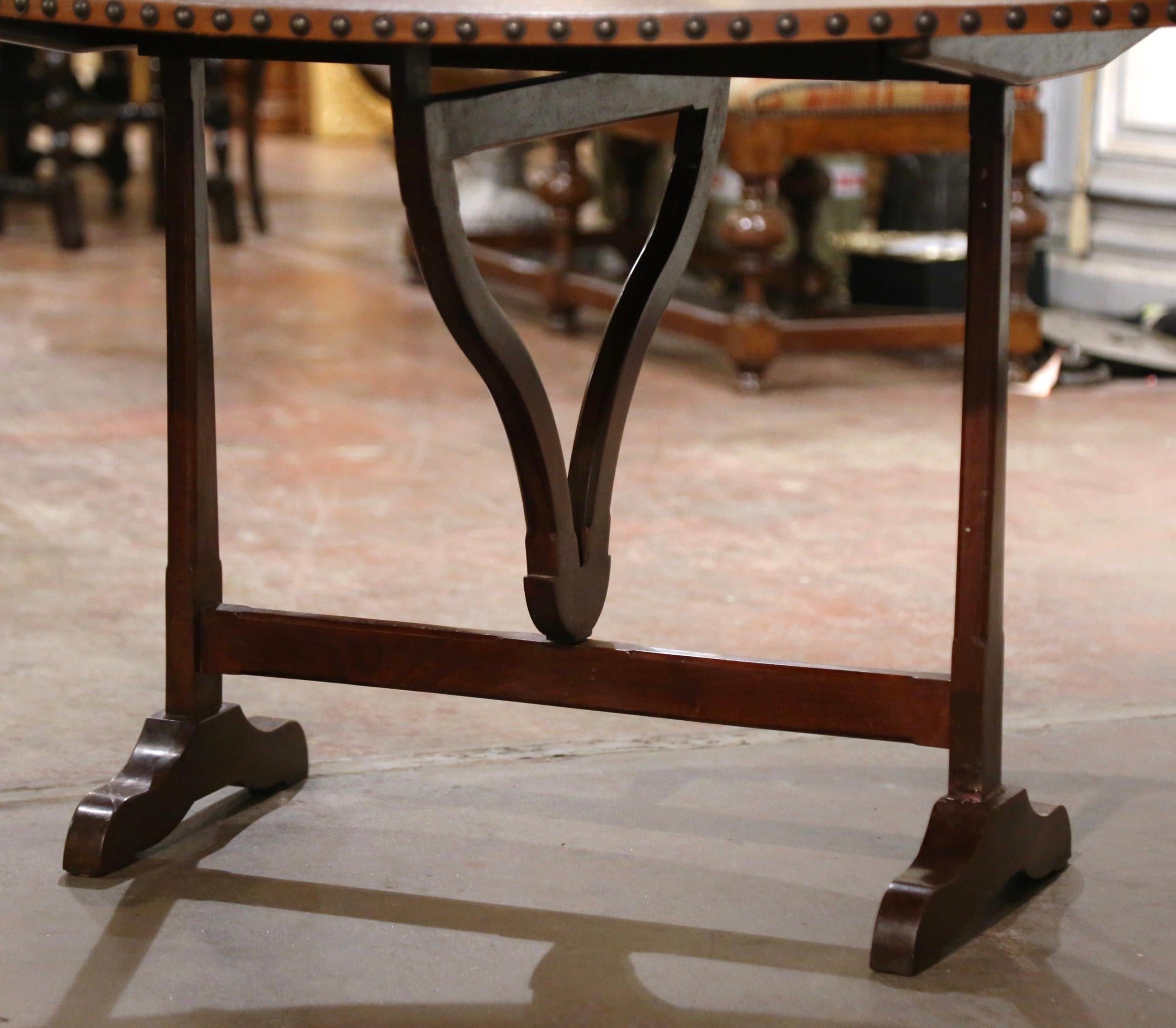 Patinated 19th Century French Leather Top Carved Walnut Tilt-Top Wine Tasting Table