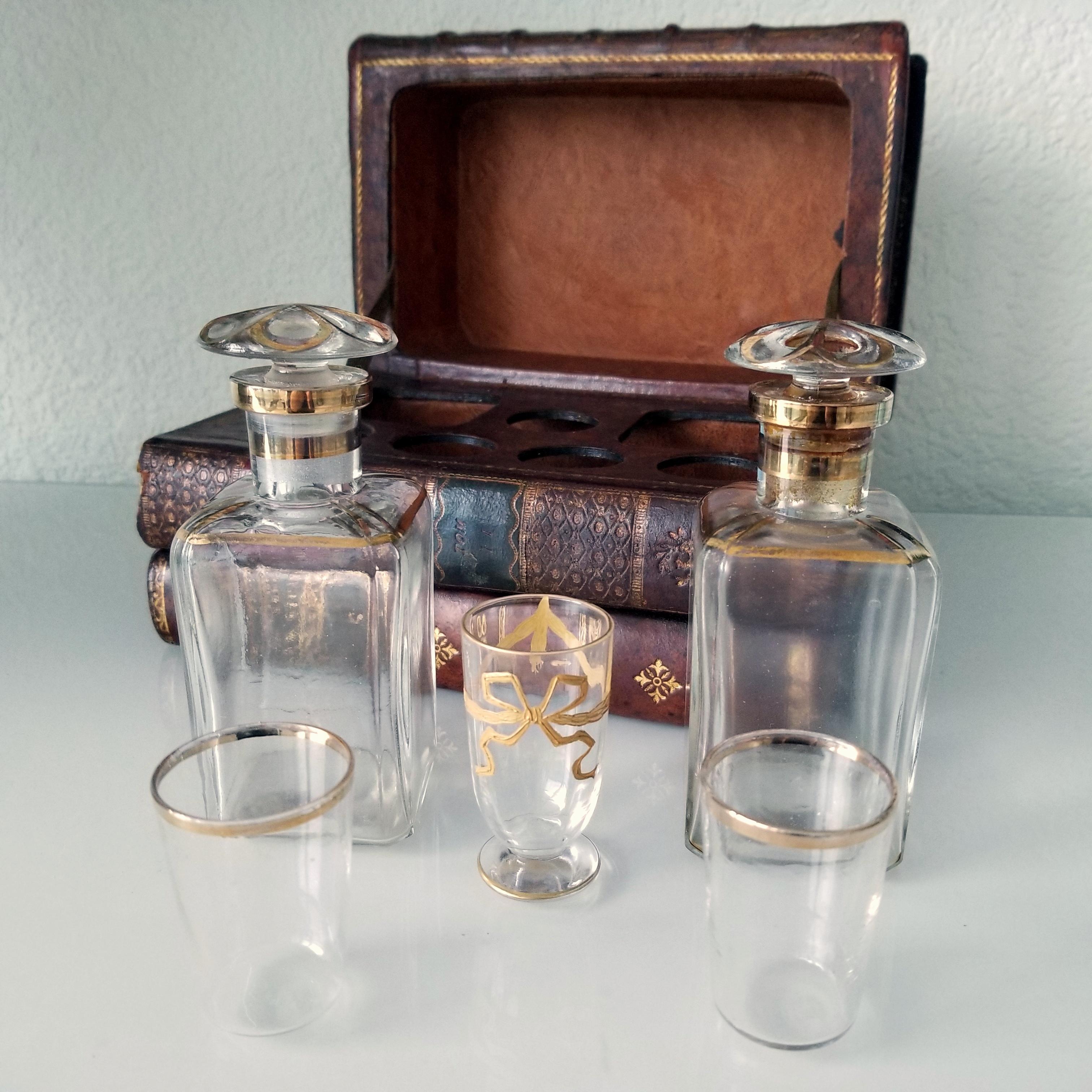 Gilt 19th Century French Leatherbound Book Tantalus with Shot Glasses and Decanters For Sale