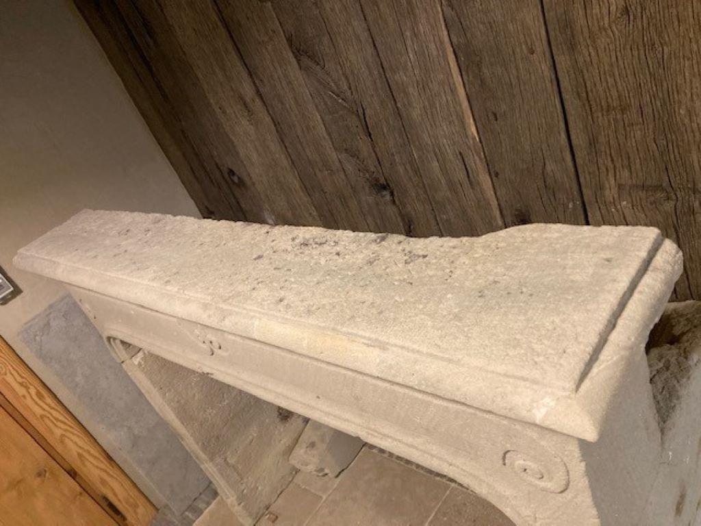 Carved 19th Century French Limestone Fireplace Mantel  For Sale