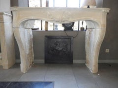 19th Century French Limestone Louis XV Fireplace Mantel