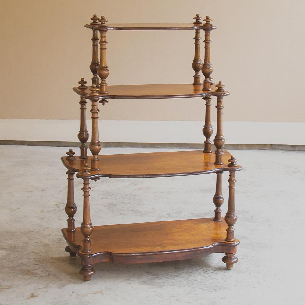 19th century French Louis Philippe bookshelf ~ Etagere is a study in tailored elegance, with subtle curves in the shelving which steps back to smaller depths as one moves up the piece, to the scrolled supports on each side. Hand crafted from solid