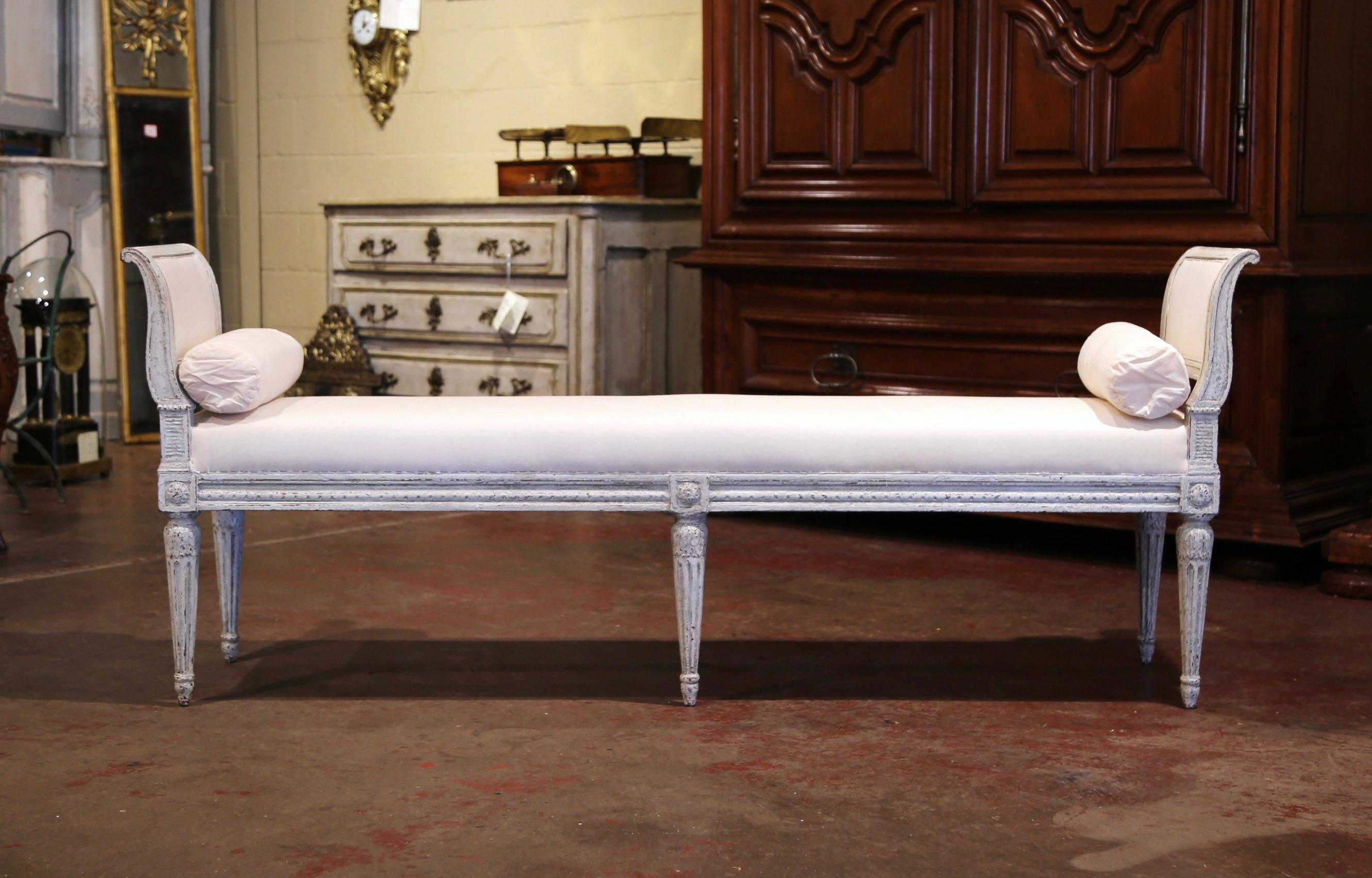 Place this elegant antique six-leg bench at the foot of a king size bed or in your living room for extra, versatile seating. Crafted in France, circa 1880, the traditional banquette stands on six tapered and fluted legs embellished at the shoulders