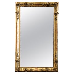 19th Century French Louis Philippe Carved Giltwood Mirror with Floral Motifs