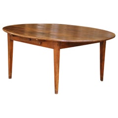 Mesa de comedor ovalada de granja francesa Louis Philippe de castaño y roble del siglo XIX