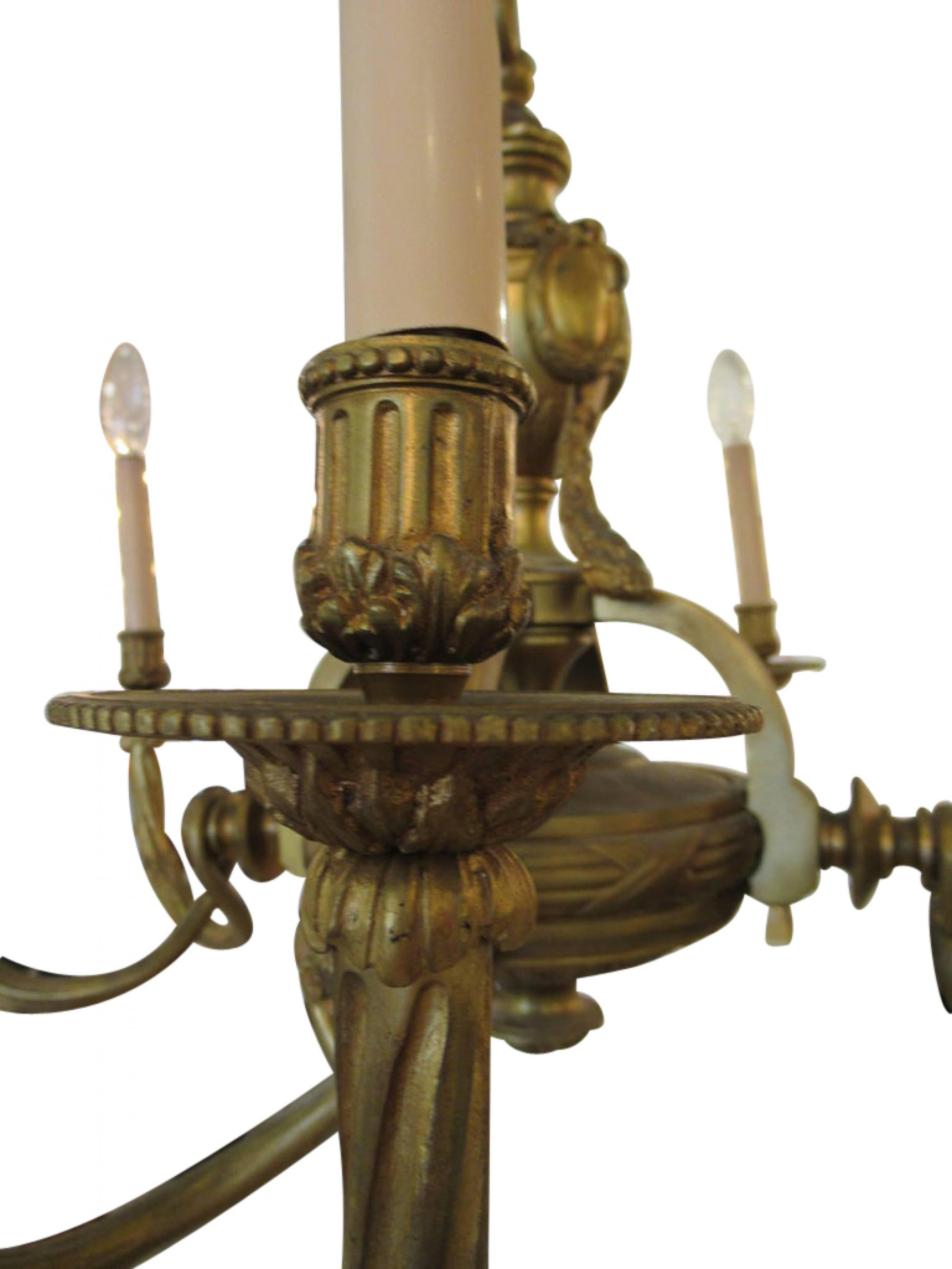 19th Century French Louis Philippe doré bronze eight-Arm chandelier with decorative garland swags and medallion motifs. 