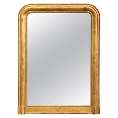 Miroir de cheminée français du 19ème siècle en bois doré Louis Philippe avec décor floral Miroir de cheminée français du 19ème siècle en bois doré Louis Philippe avec décor floral