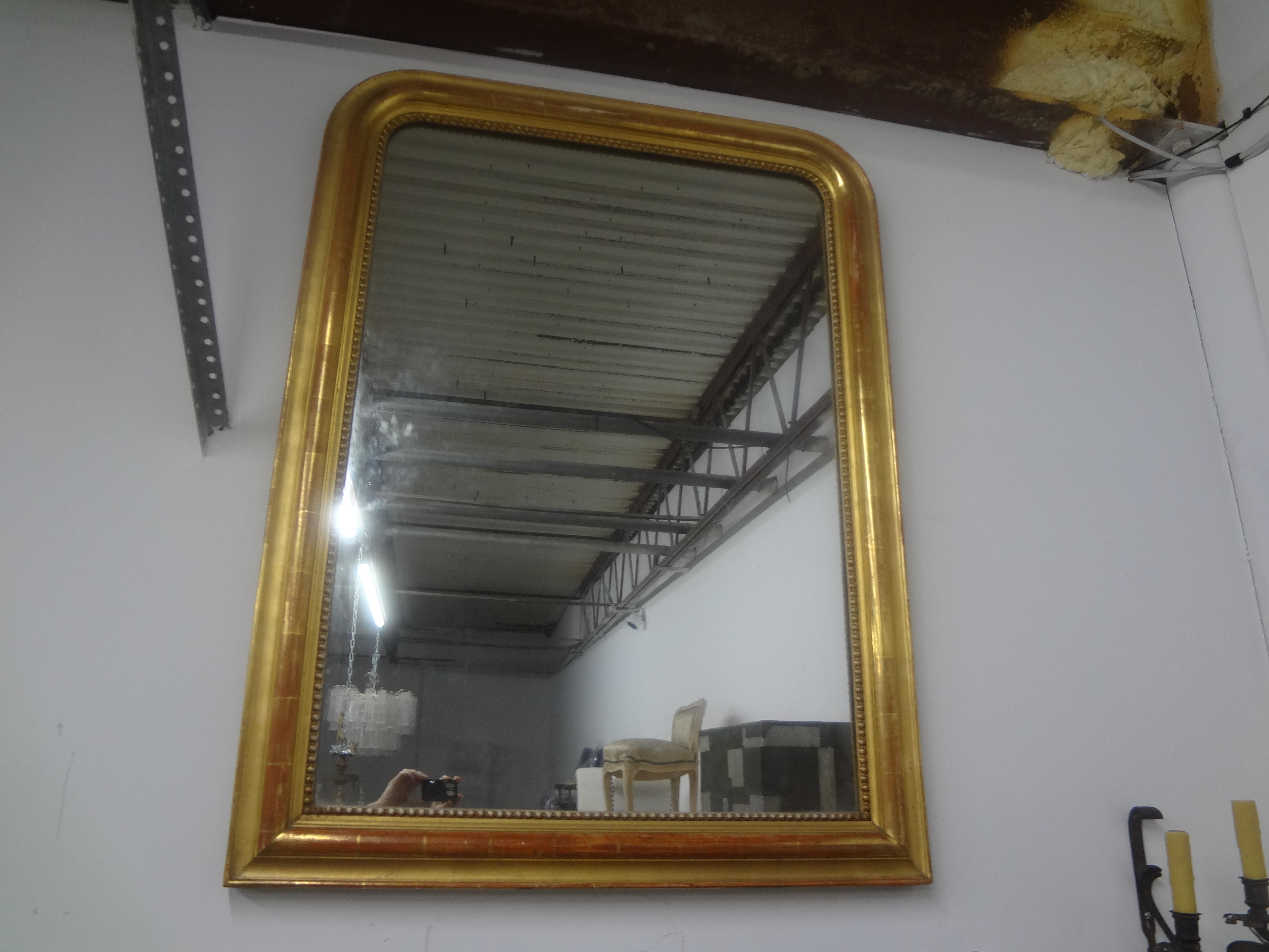 19th Century French Louis Philippe Giltwood Mirror.
This stunning period antique French Louis Philippe gilt wood mirror has gorgeous patina and clean lines that are perfect in any decor.