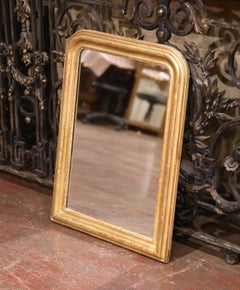 Miroir français du 19ème siècle en bois doré Louis Philippe avec décor floral gravé