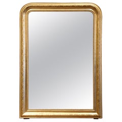 Miroir français du 19ème siècle en bois doré Louis Philippe avec décor floral gravé