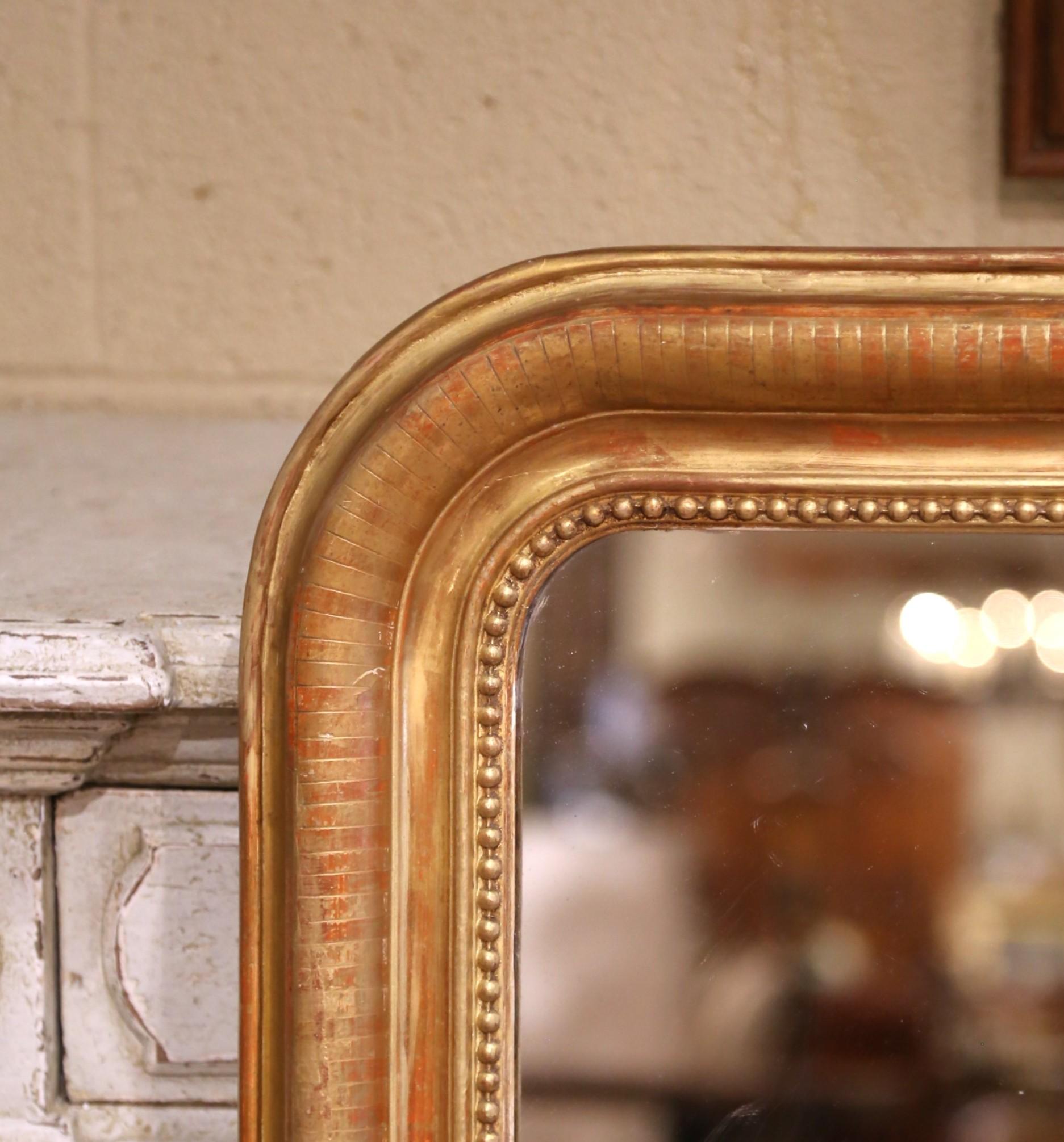 Hand-Carved 19th Century French Louis Philippe Giltwood Mirror with Engraved Stripe Decor For Sale