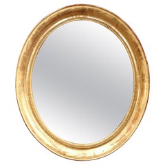 19th Century French Louis Philippe Giltwood Oval Wall Mirror with Engraved Motif