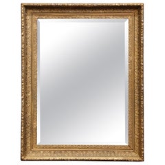 Specchio da parete in legno dorato Louis Philippe del XIX secolo con motivi di fogliame