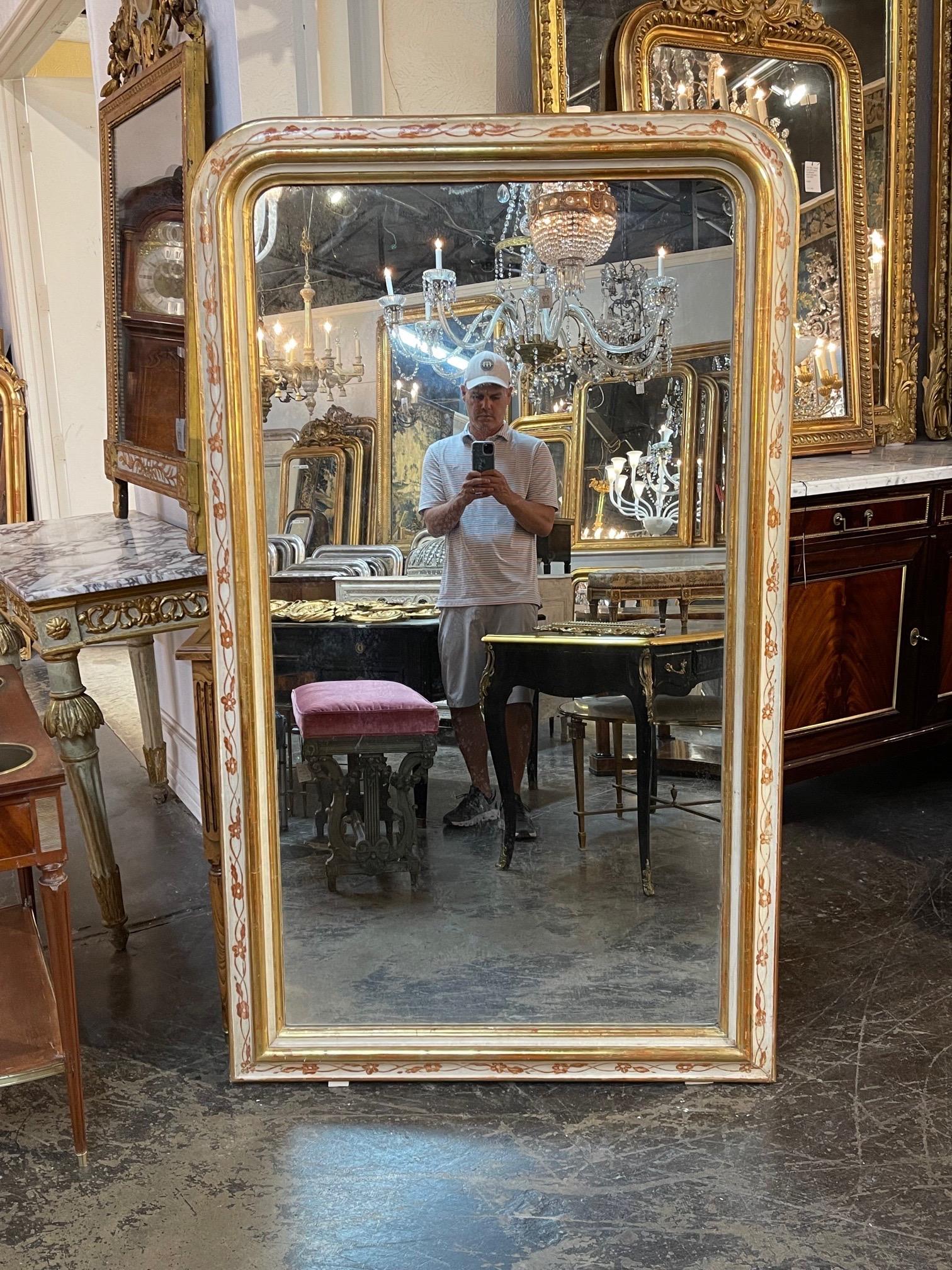 Gorgeous 19th century French Louis Philippe mirror with gesso and floral pattern. The mirror also has original glass. So pretty and very rare!