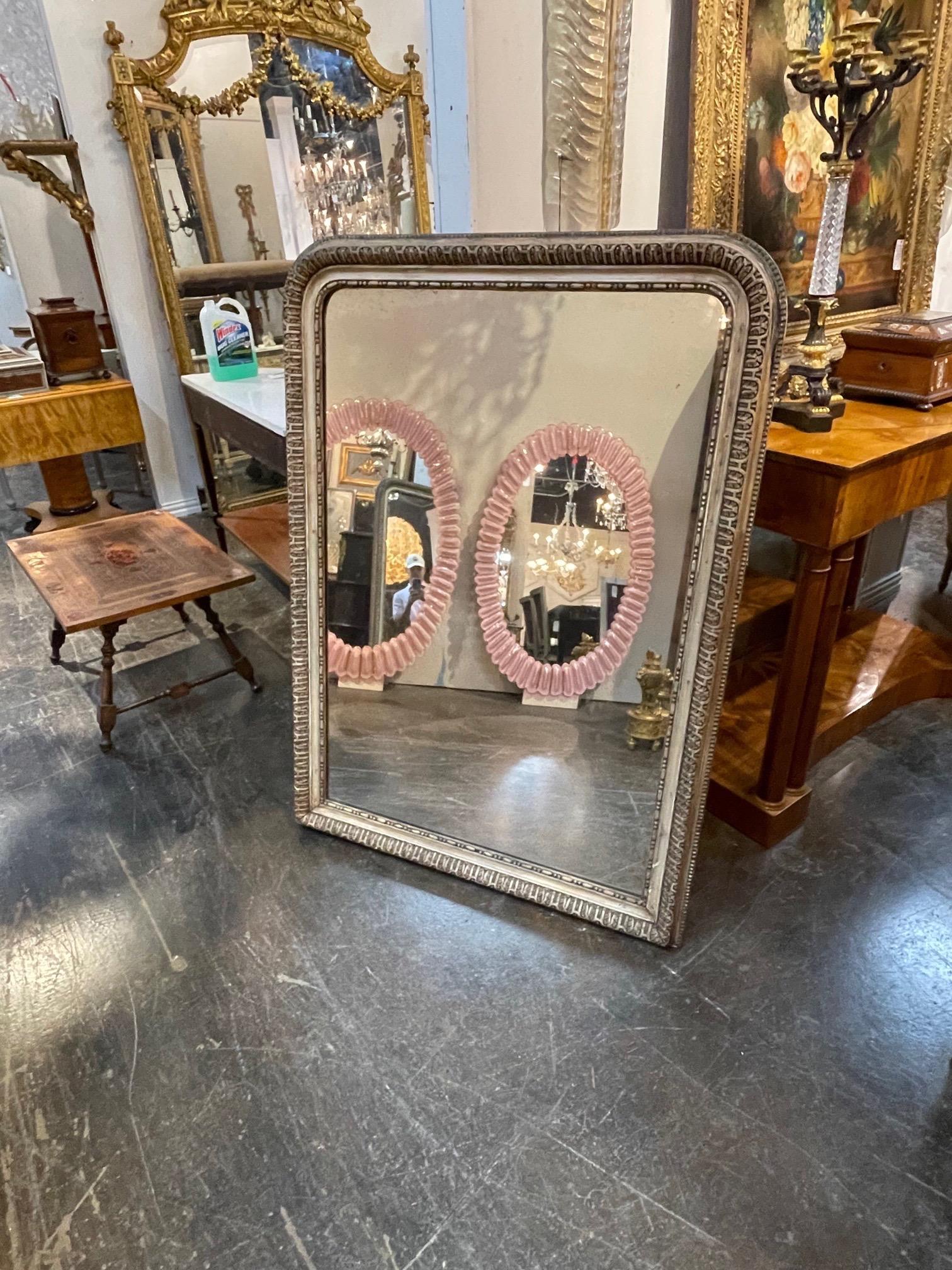 Beautiful 19th century French Louis Philippe mirror with waxed gesso finish. Very fine patina and pattern on this piece. So pretty!