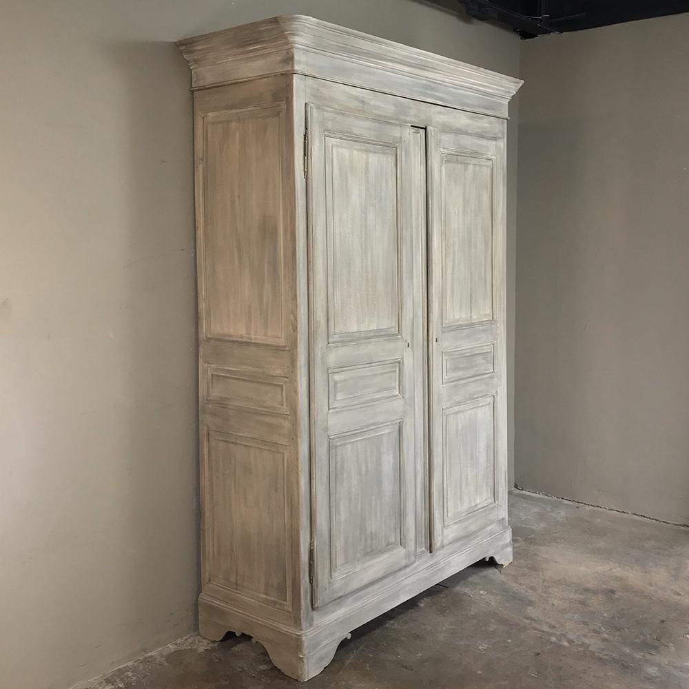 19th century French Louis Philippe painted cherrywood armoire features the stately tailored lines that have made this style popular for well over a century and a half! Perfect for storage and blending with any decor,
circa 1860s.
Measures: 100 H x