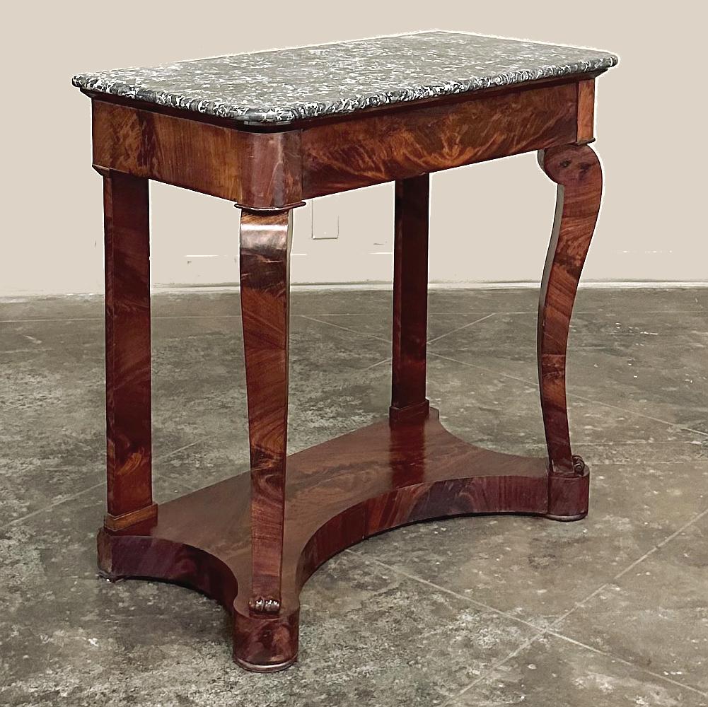 19th Century French Louis Philippe Mahogany Marble Top Console features its original gray marble top, so in vogue now and during the period itself!  The rich veining blends the various shades of gray with a white alabaster color creating a neutral