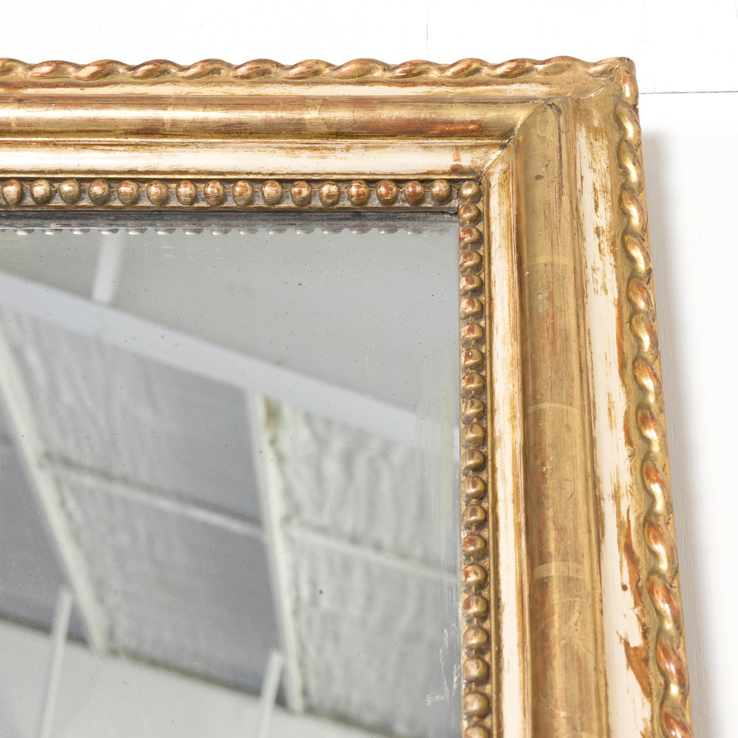 Giltwood 19th Century French Louis Philippe Period Painted and Parcel Gilt Mirror For Sale