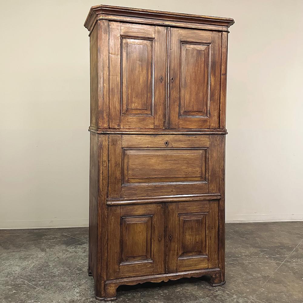 19th Century French Louis Philippe Pine Secretary ~ Bookcase is an unusual combination of tailored elegance melded with a casual impression providing both storage and a work surface, all in one!  Hand-crafted from solid pine, it features the