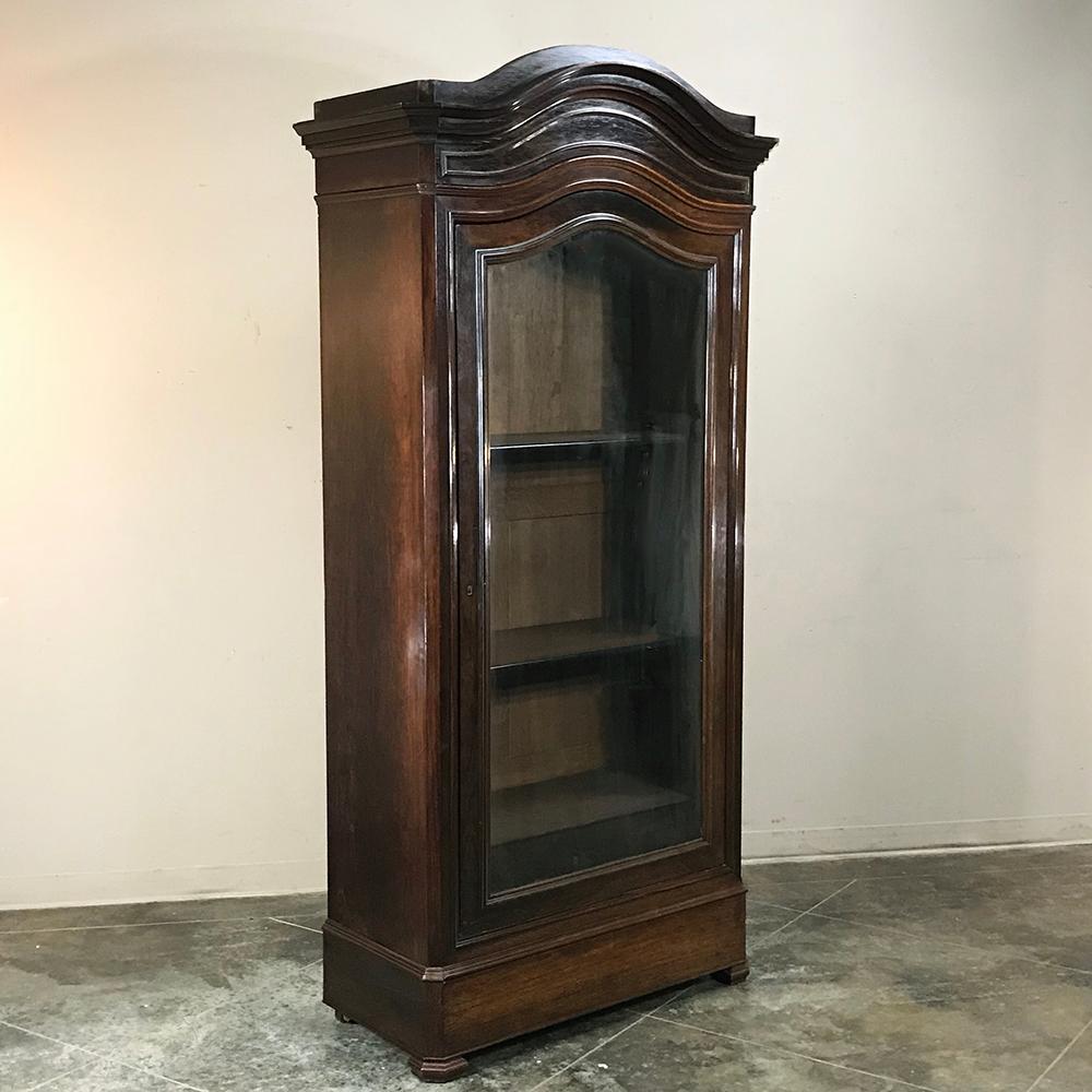 19th century French Louis Philippe rosewood display armoire, bookcase is the perfect choice for those with a special collection, prized family heirlooms, or even as a bookcase! Rosewood, sometimes called Kingwood, was considered the finest furniture